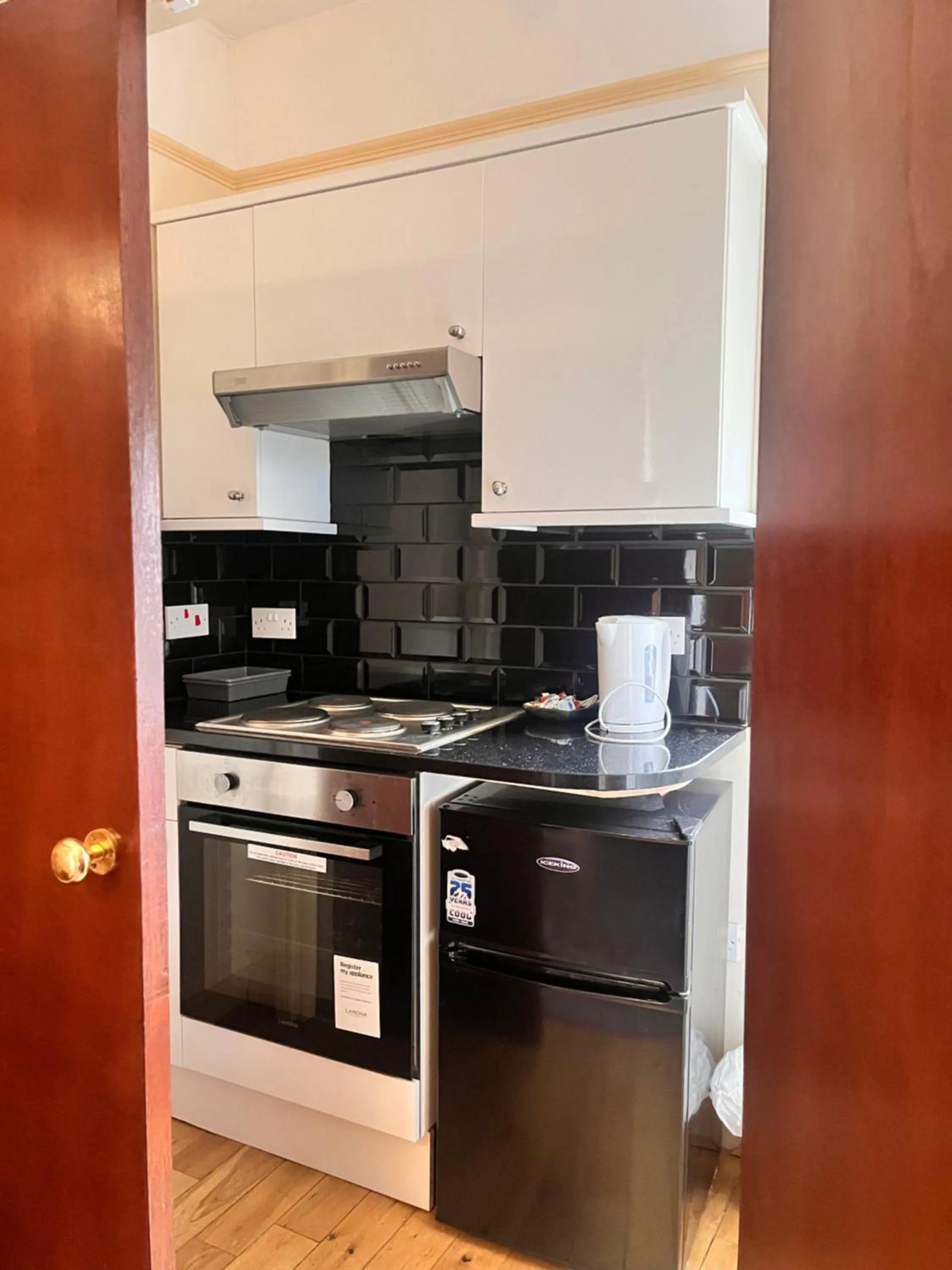 Kitchen or kitchenette in Ullet Suites