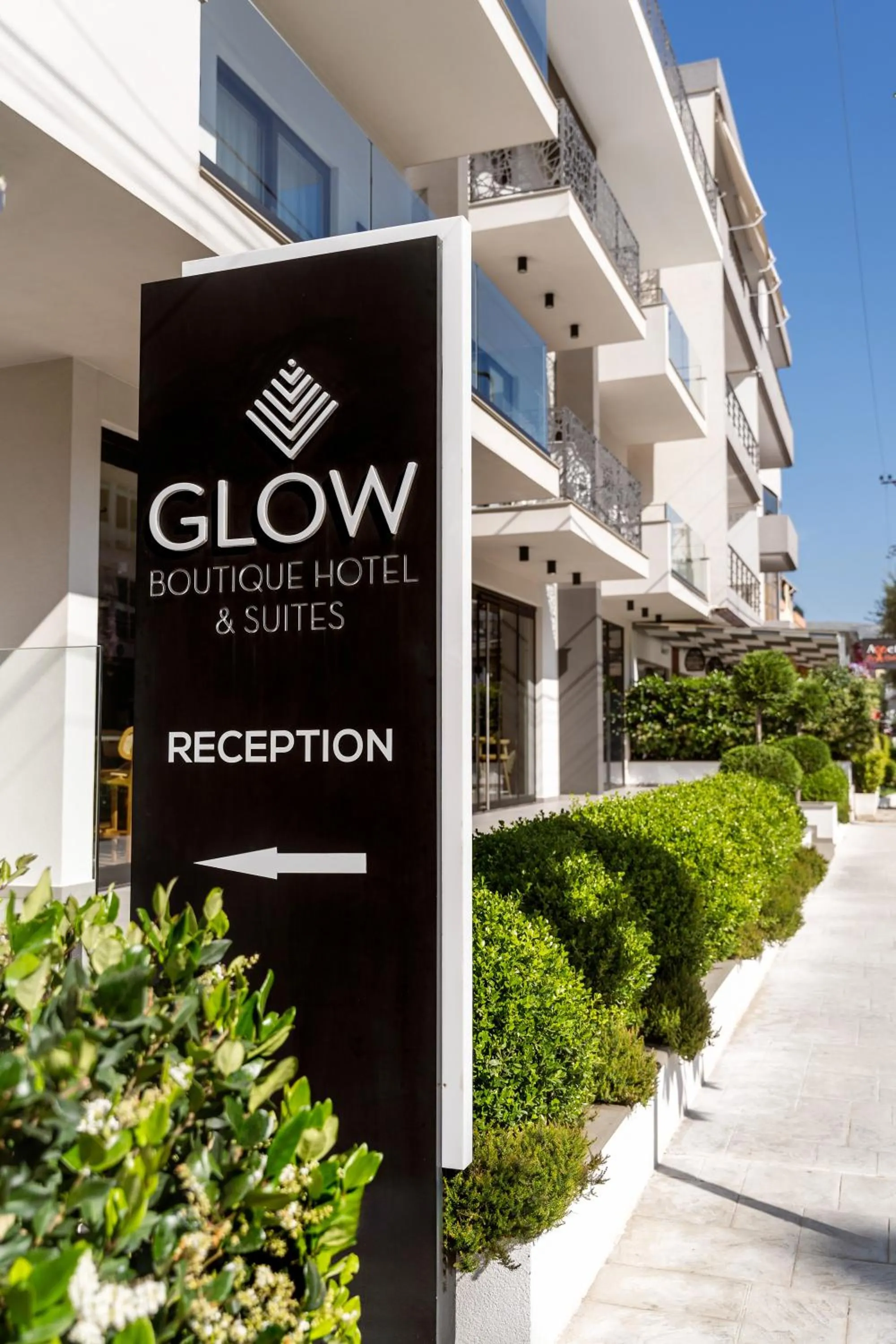 Property logo or sign in Glow Boutique Hotel & Suites