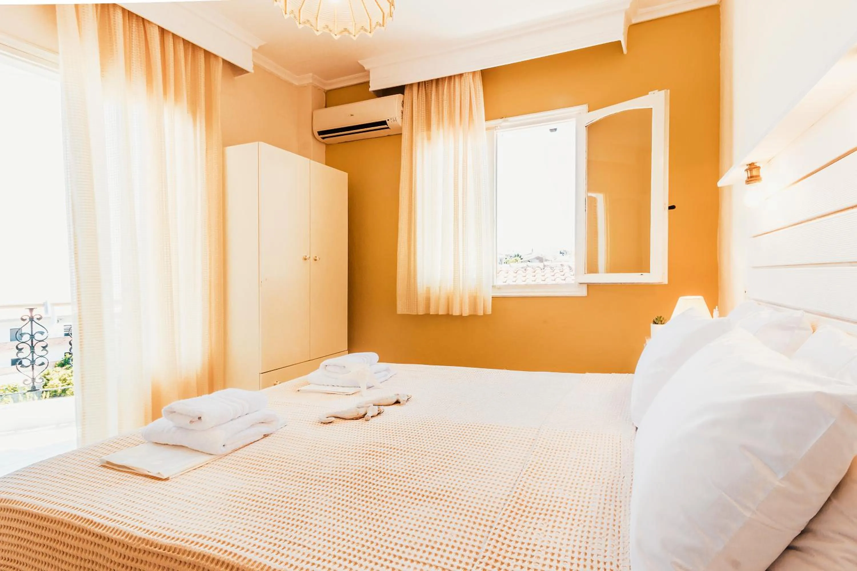 Bed in Anatoli Apartments Polichrono