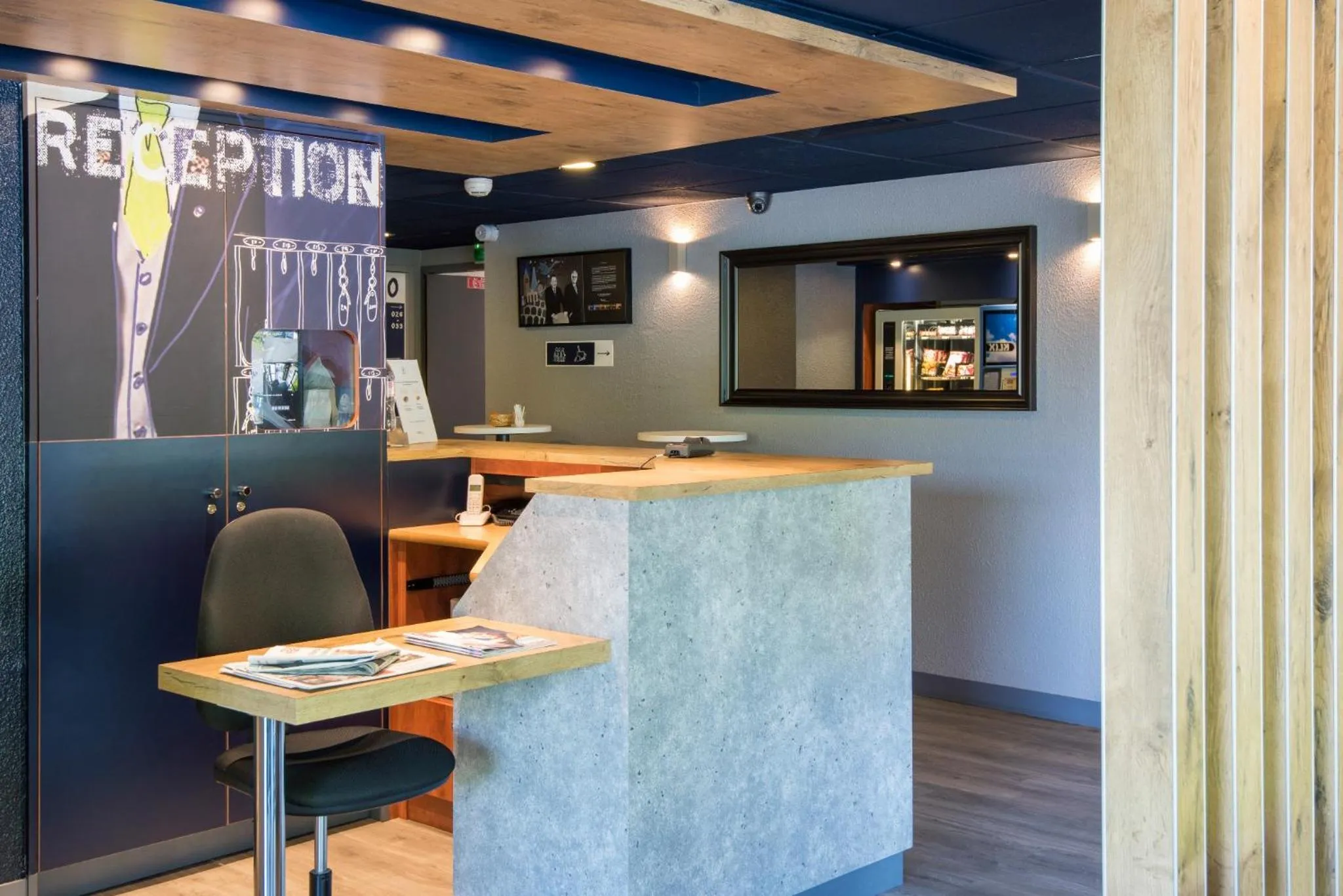 Lobby or reception in ibis budget Rennes Route de Saint Malo