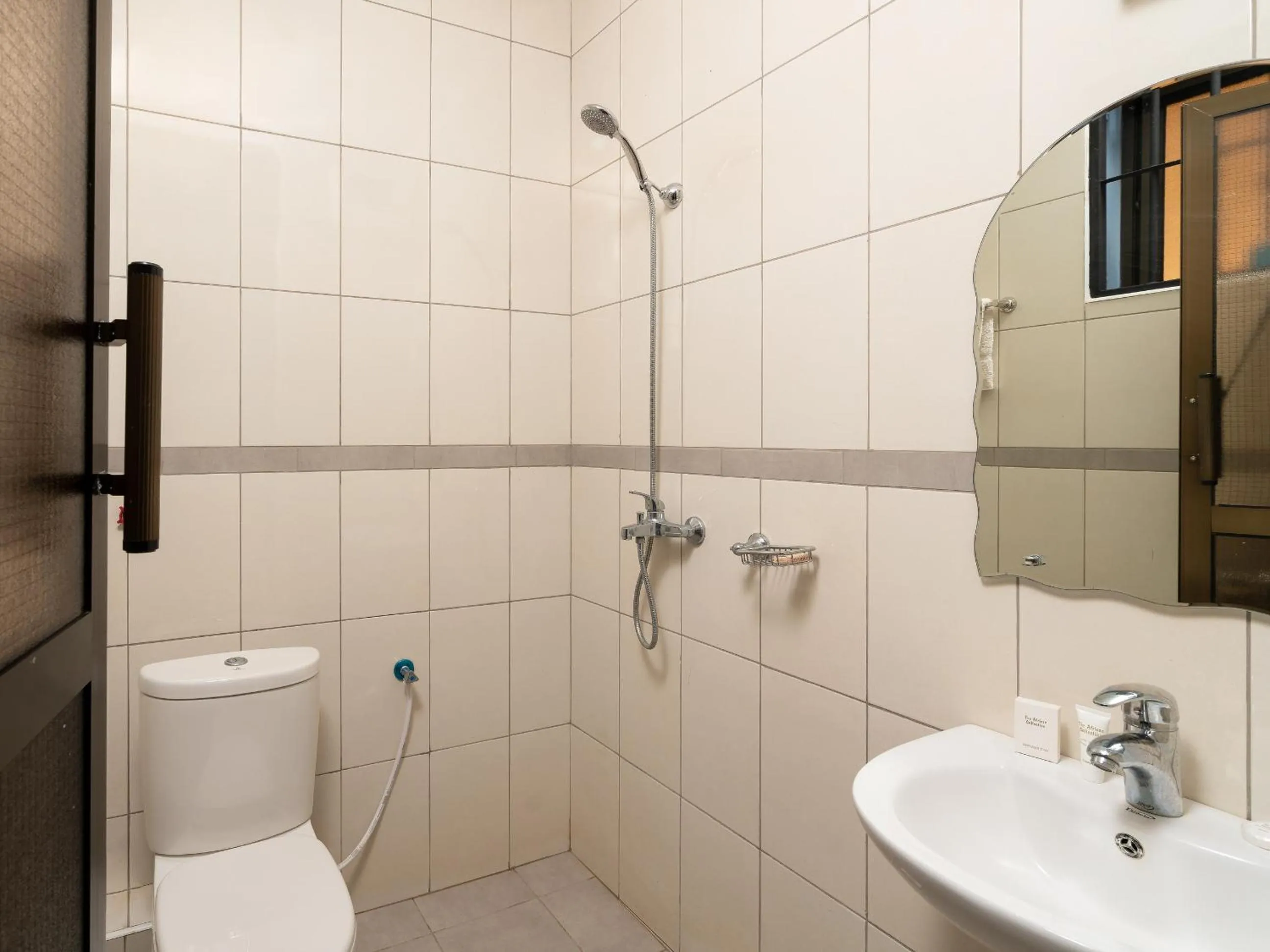 Shower in Mrimba Palm Hotel