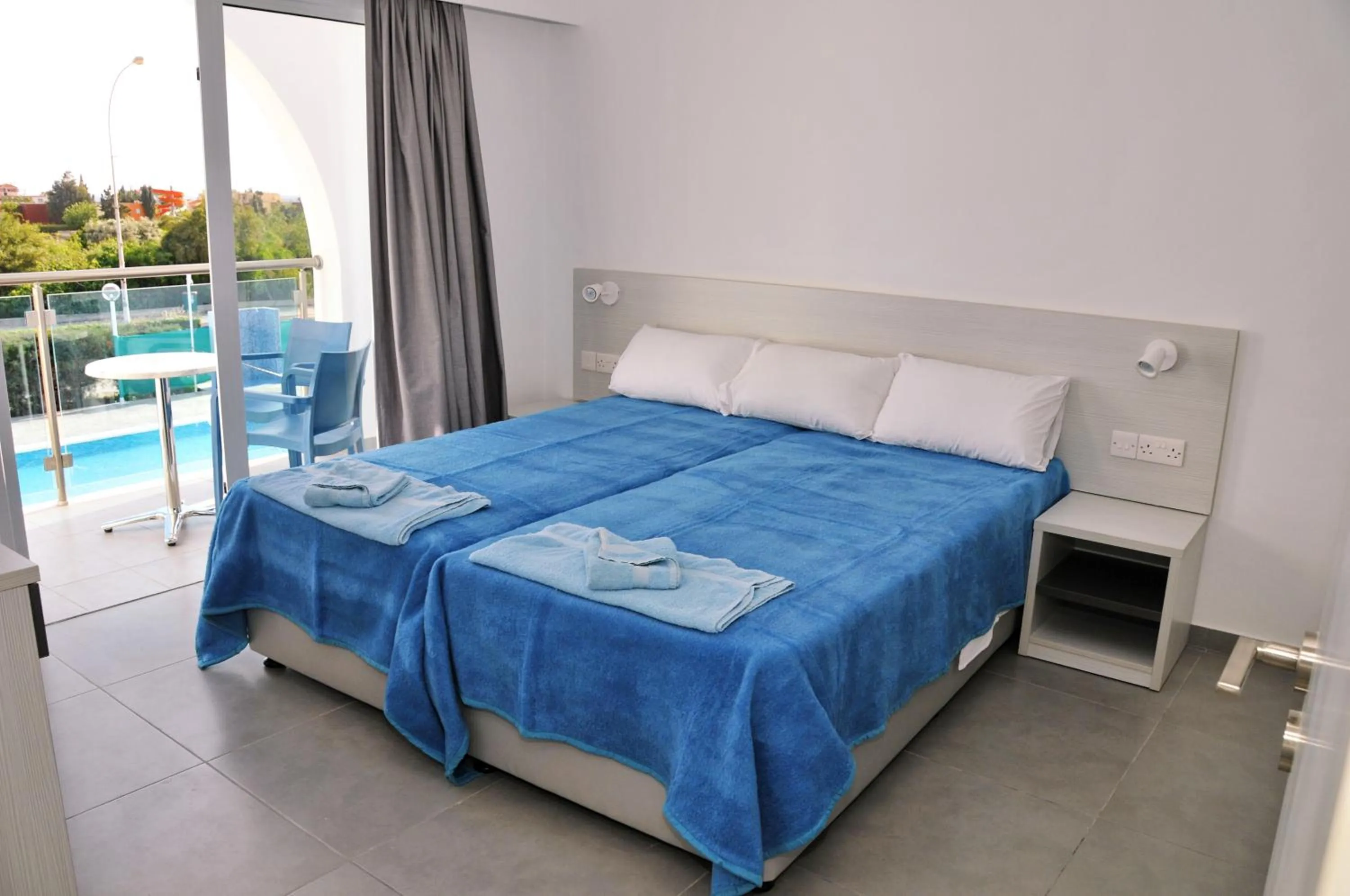 Bed in Kaos Hotel Apartments