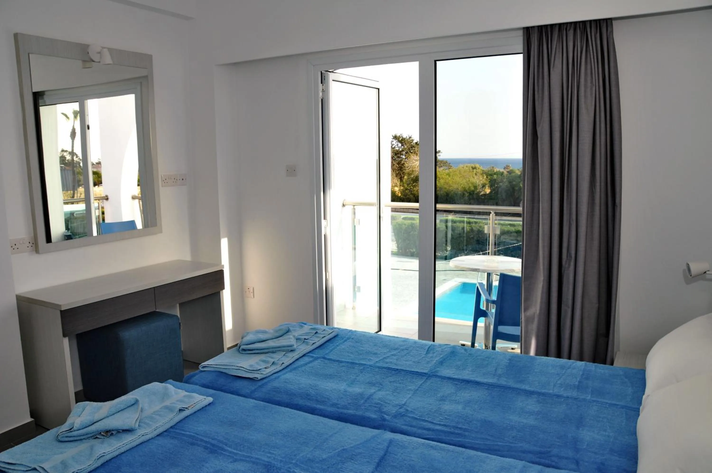 Bed in Kaos Hotel Apartments