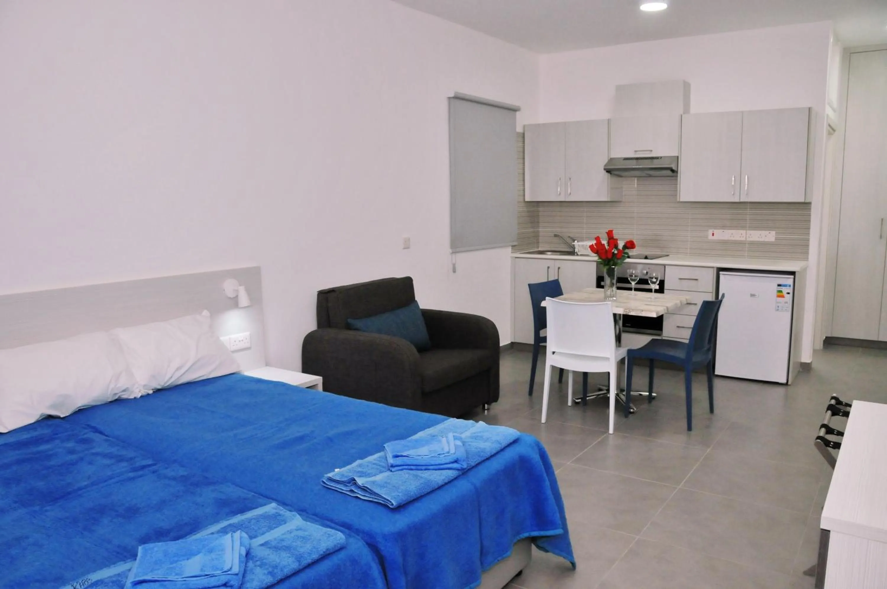 Bed in Kaos Hotel Apartments