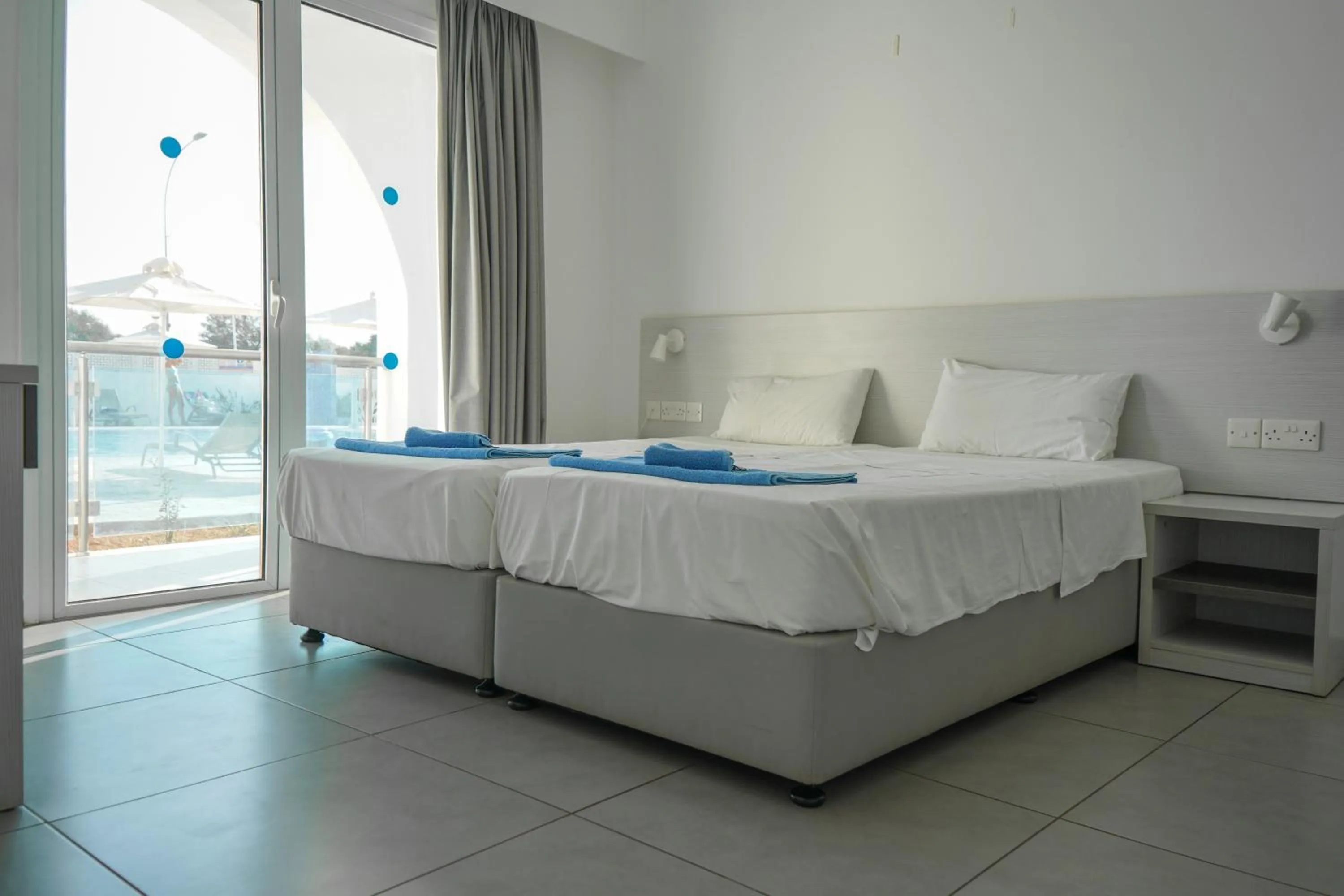 Bed in Kaos Hotel Apartments