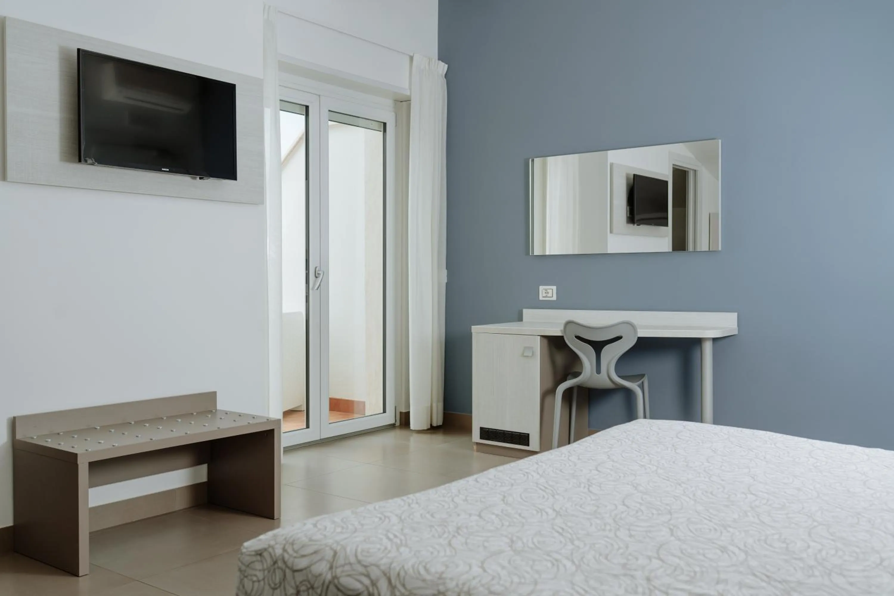 Bed in Hotel Caravel