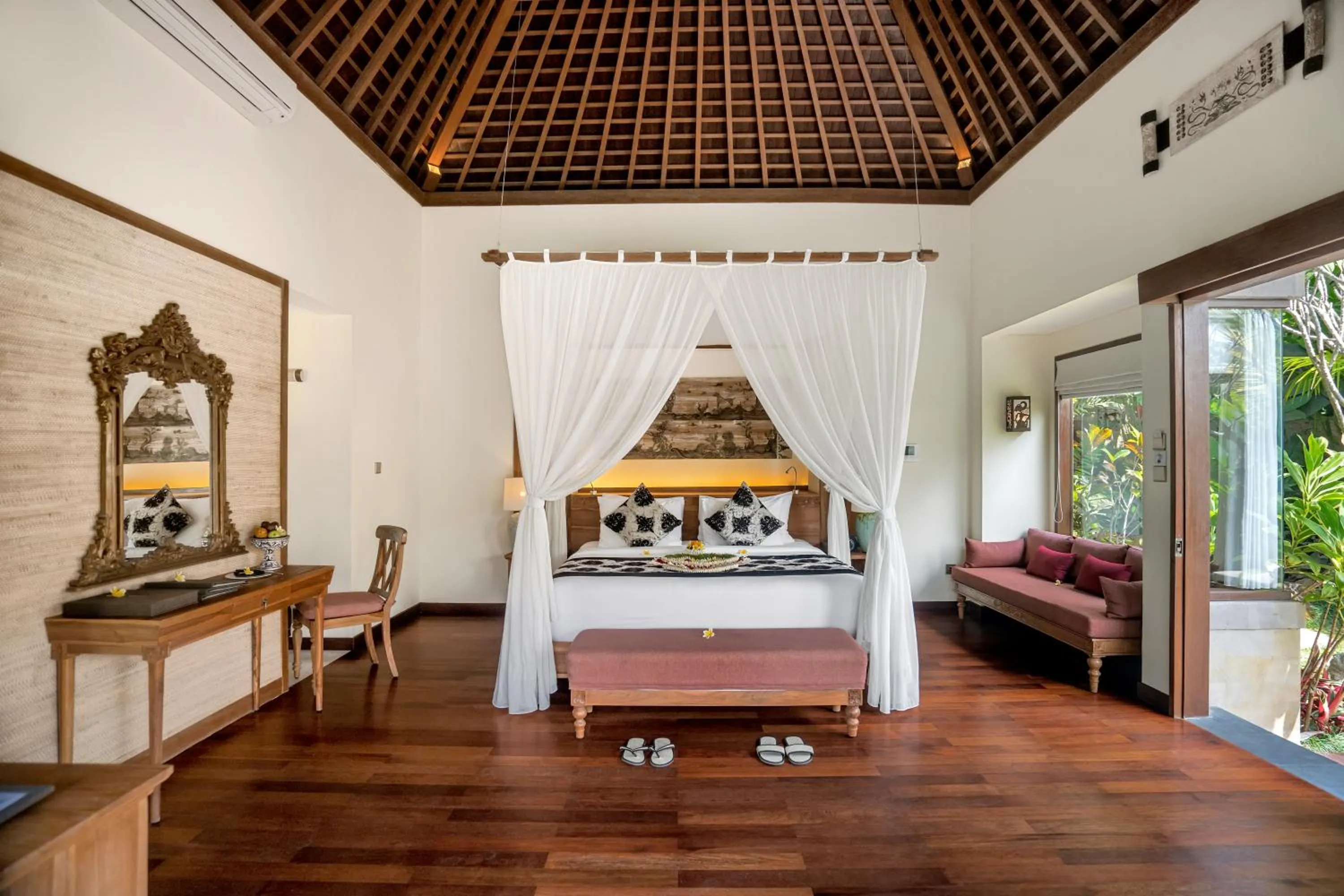 Bed in The Kayon Jungle Resort