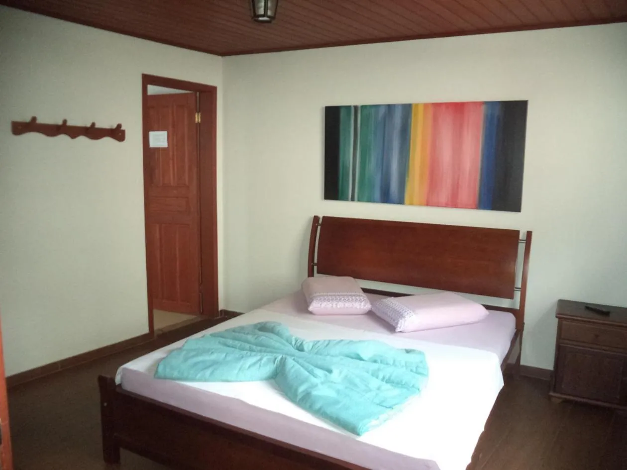 Bed in Pousada Dona Denis