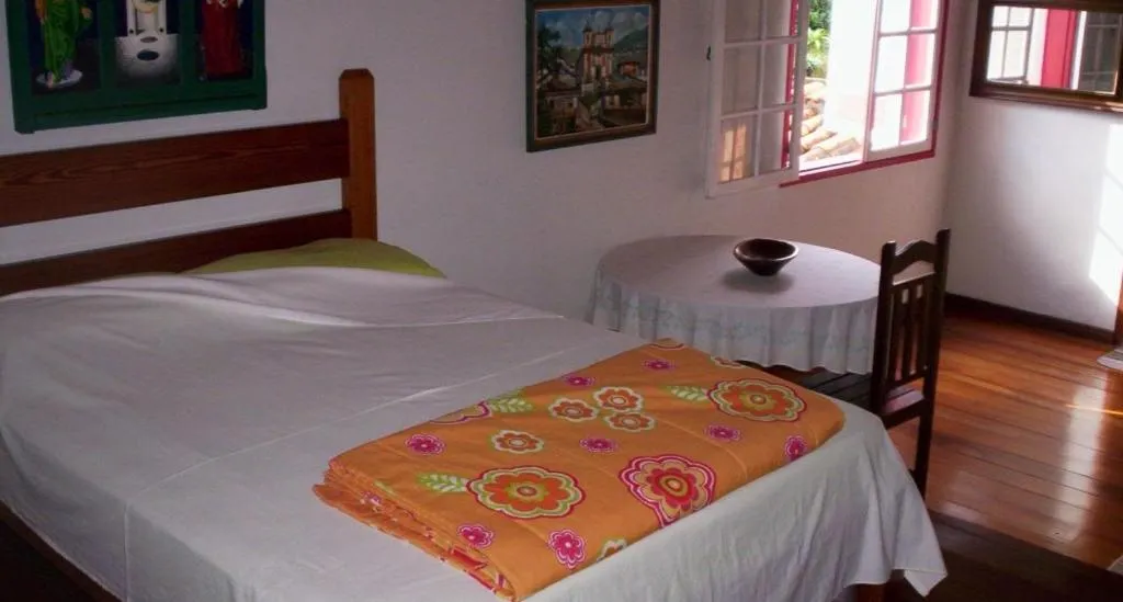 Photo of the whole room, Bed in Pousada Dona Denis