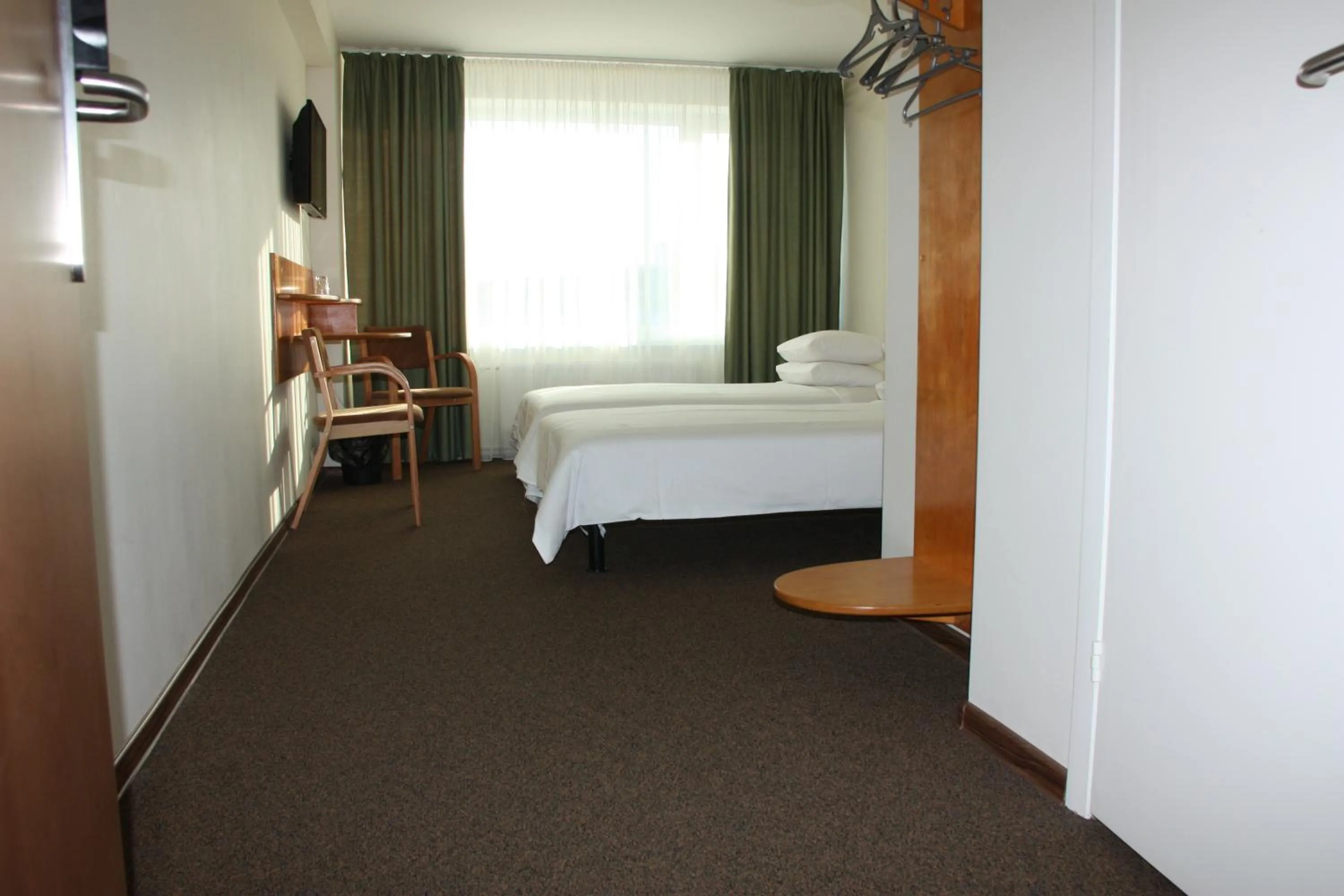 Bed in Hotel Madona