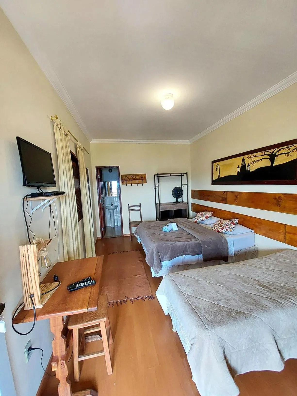 Bed in Pousada Inconfidência Mineira