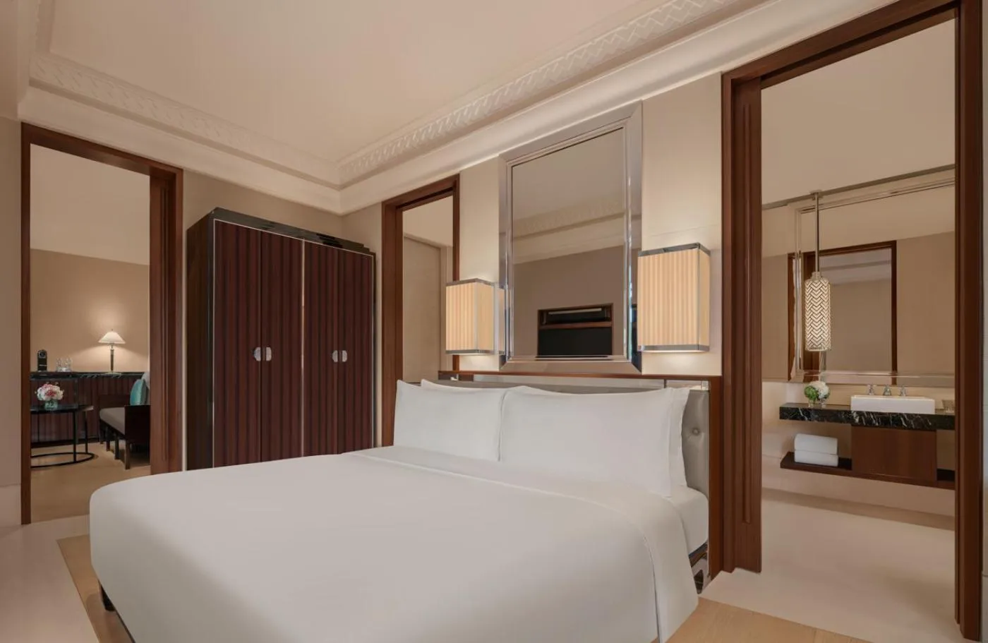 Bed in The Capitol Kempinski Hotel Singapore