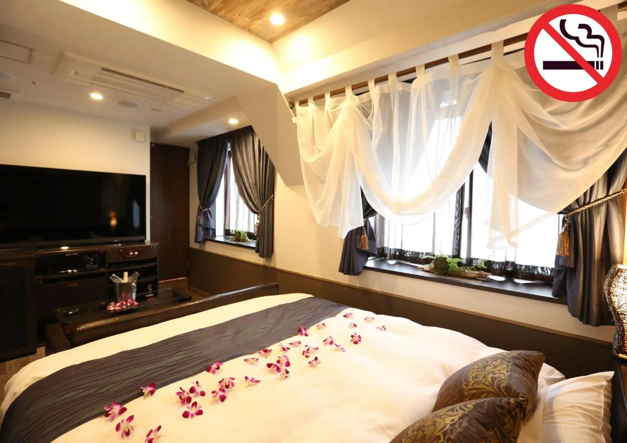 Bed in HOTEL PetitBali Higashi-Shinjuku