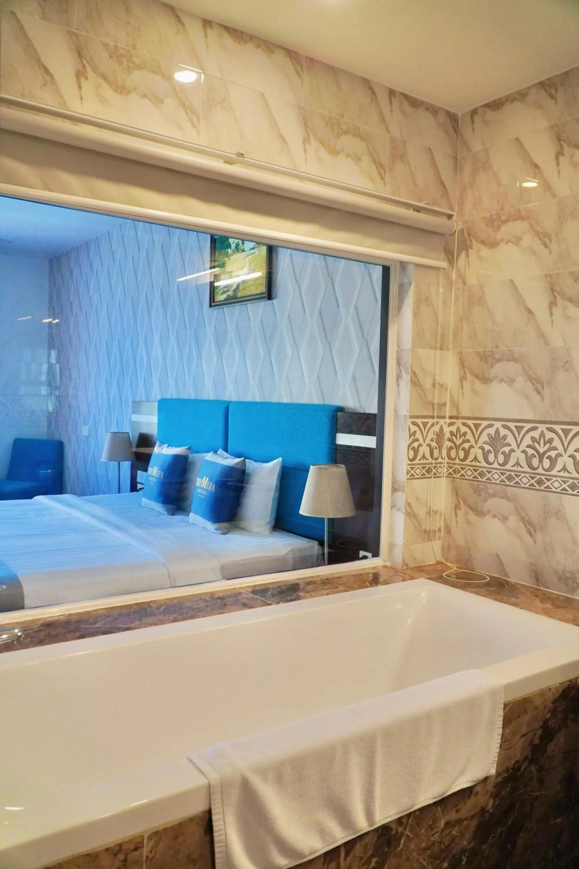 Bed in The Mira Boutique Hotel