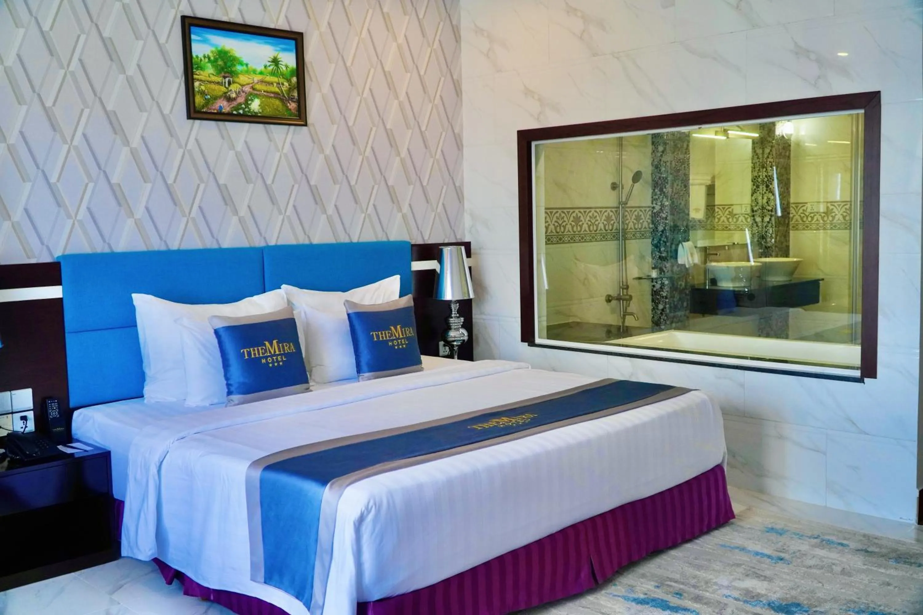 Bed in The Mira Boutique Hotel