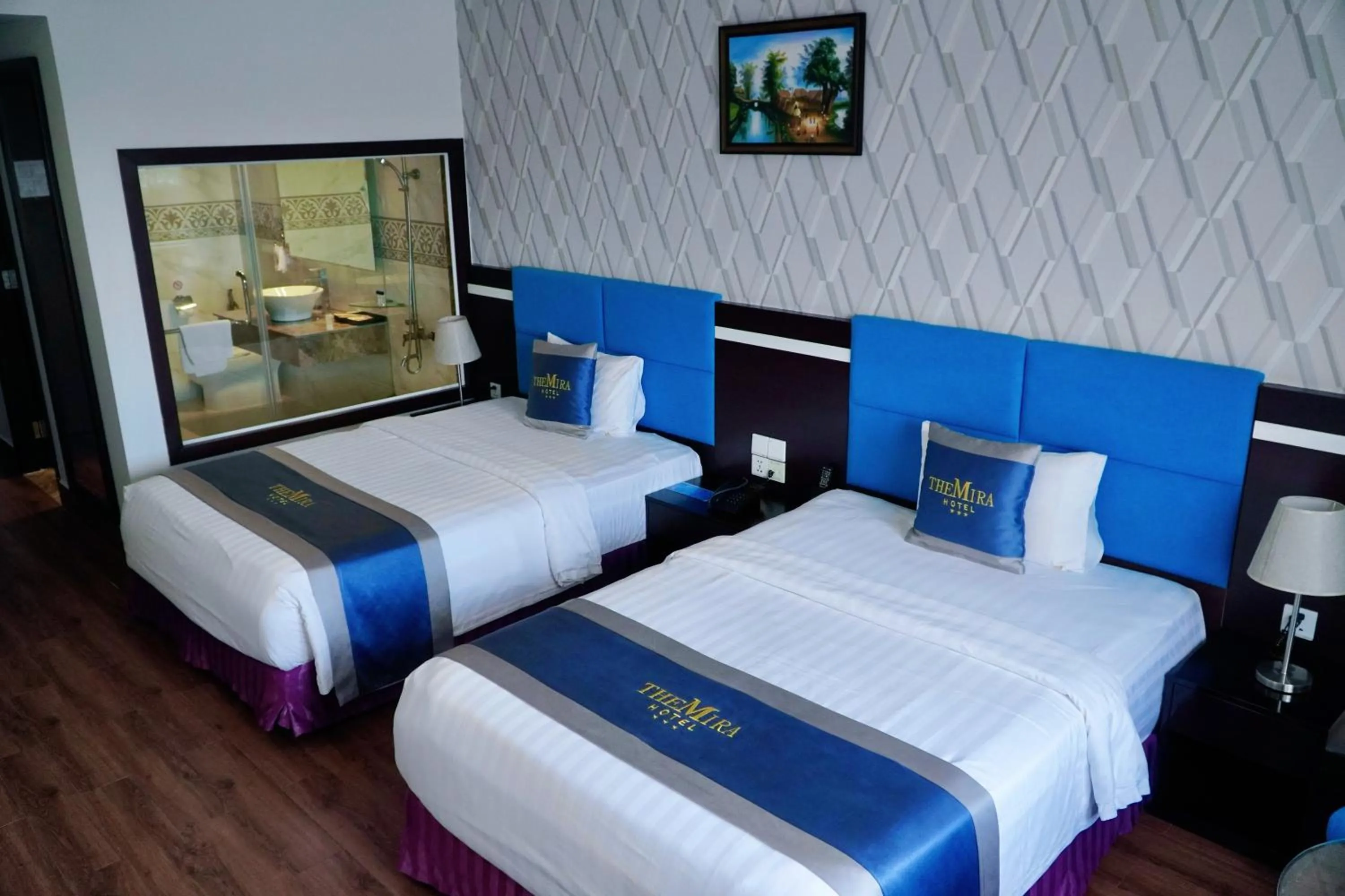 Bed in The Mira Boutique Hotel