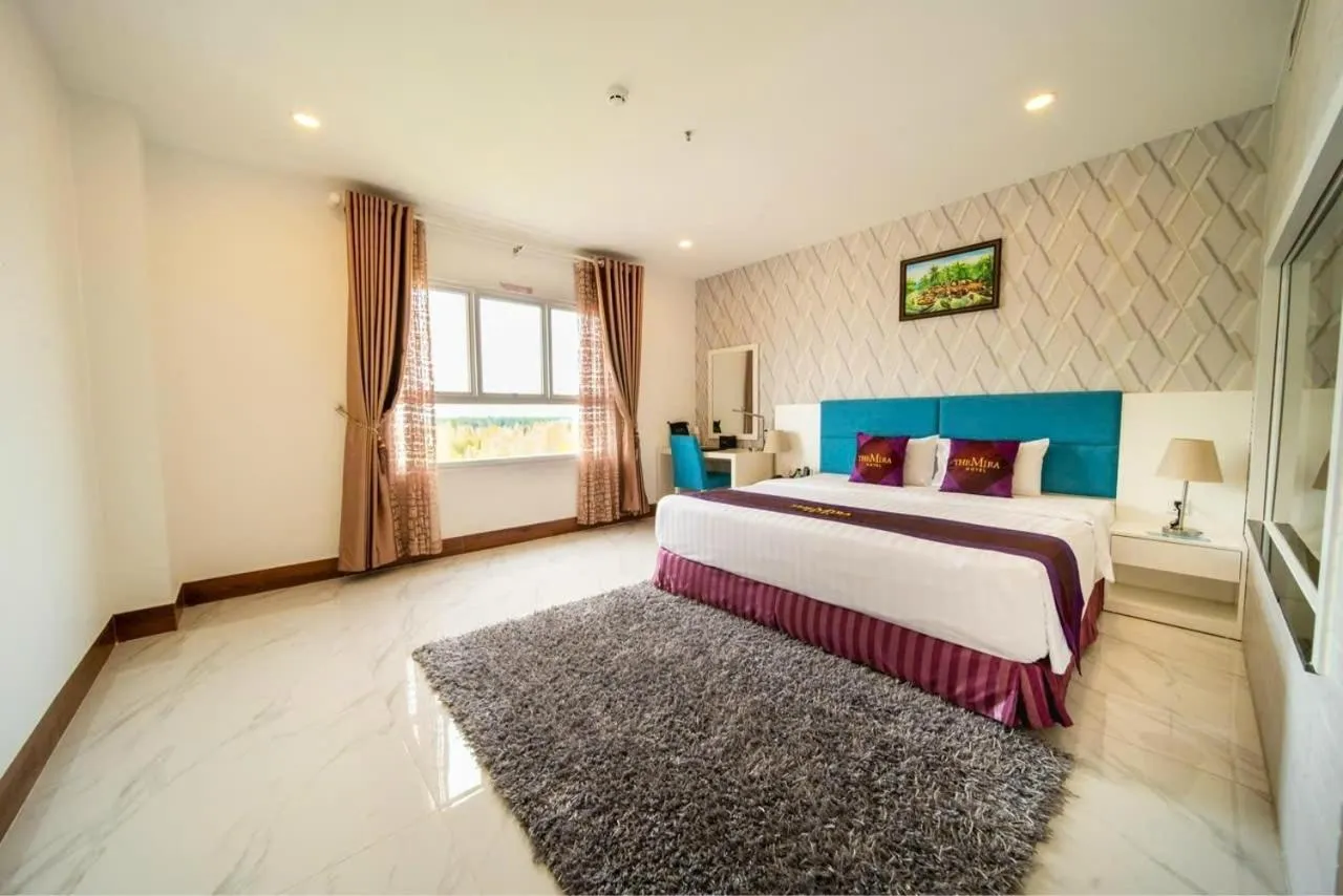 Bed in The Mira Boutique Hotel