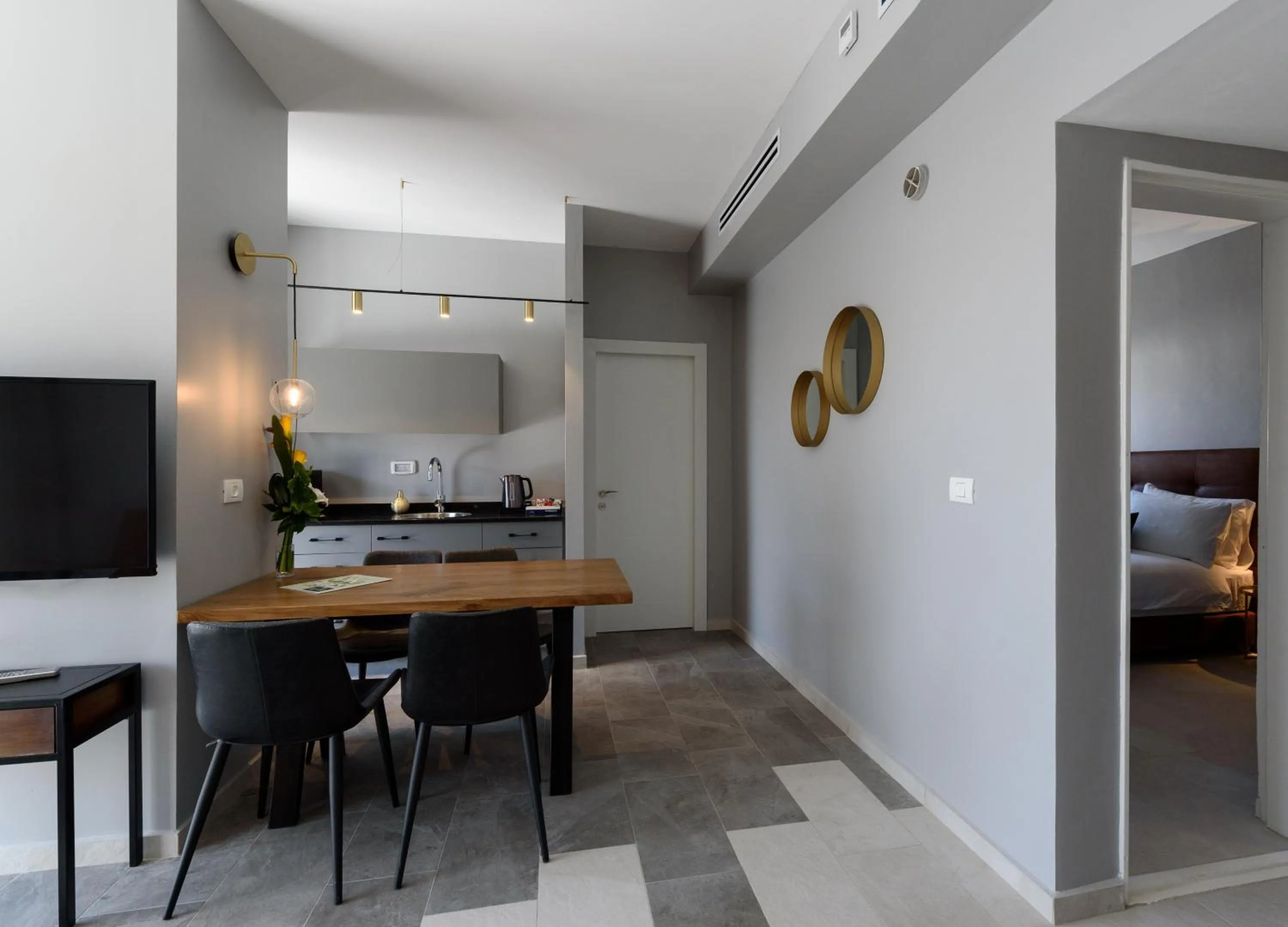 Photo of the whole room, Bed in The Roof - By Sea Land Suites