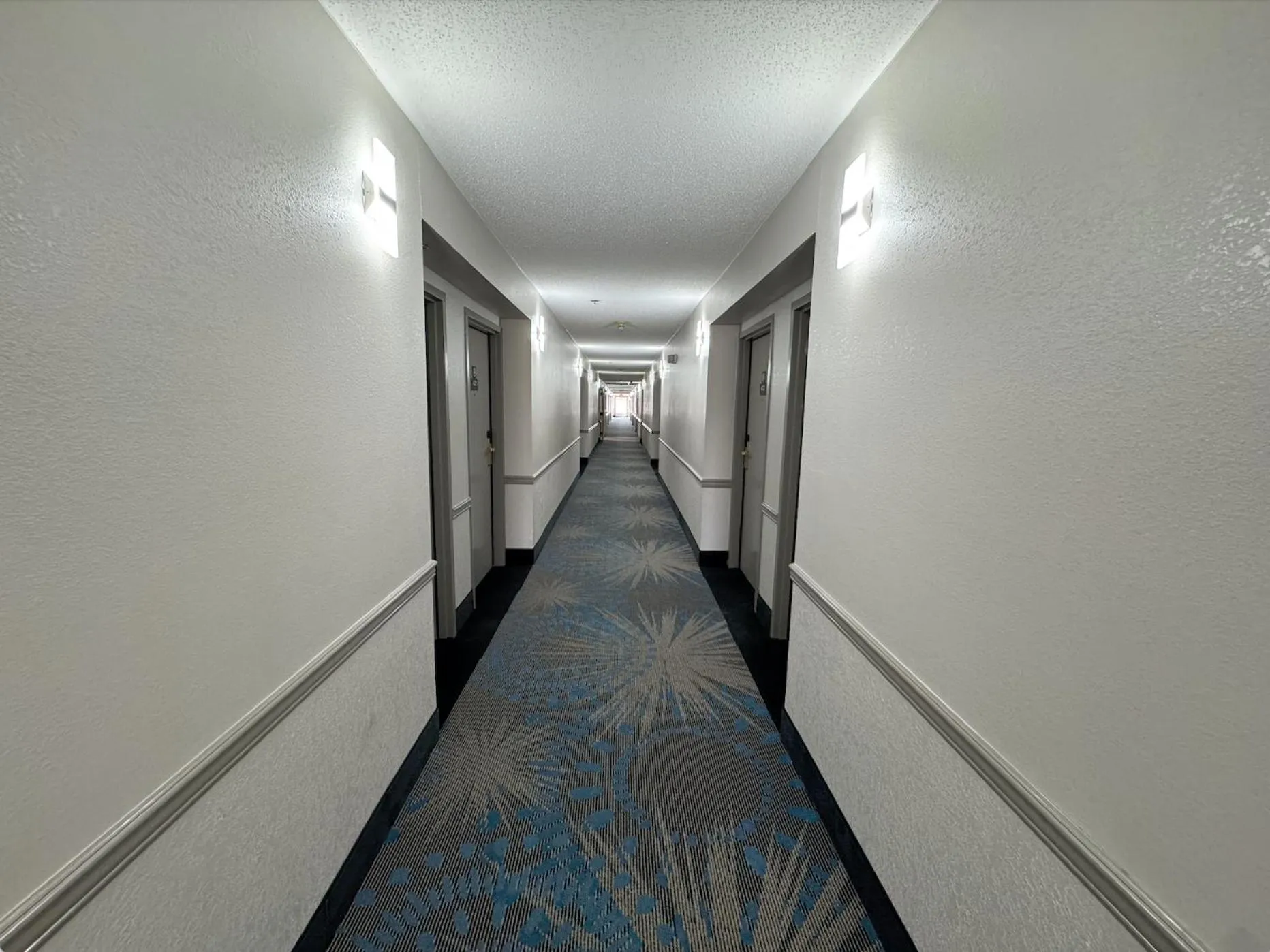 Property building in Days Inn & Suites by Wyndham Cedar Rapids