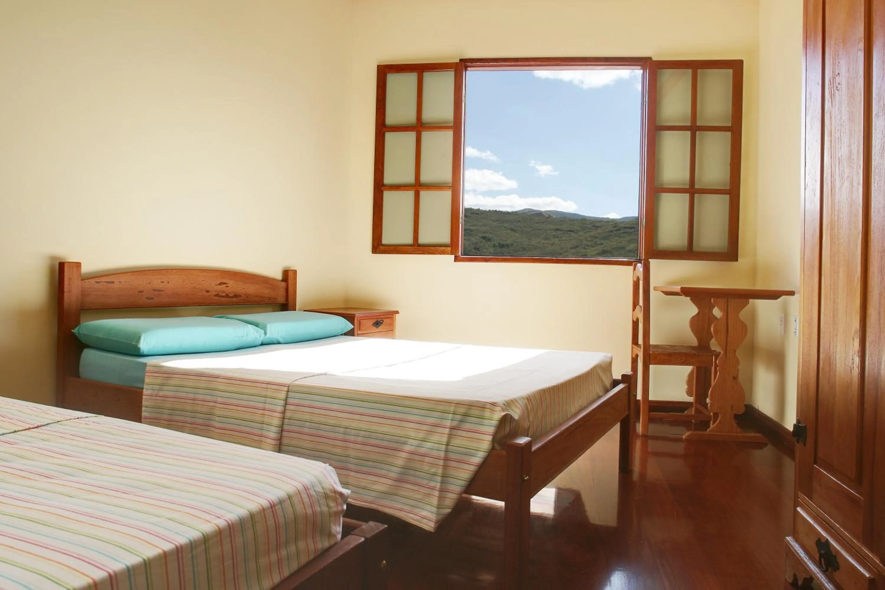Bed in Pousada Rainha dos Anjos
