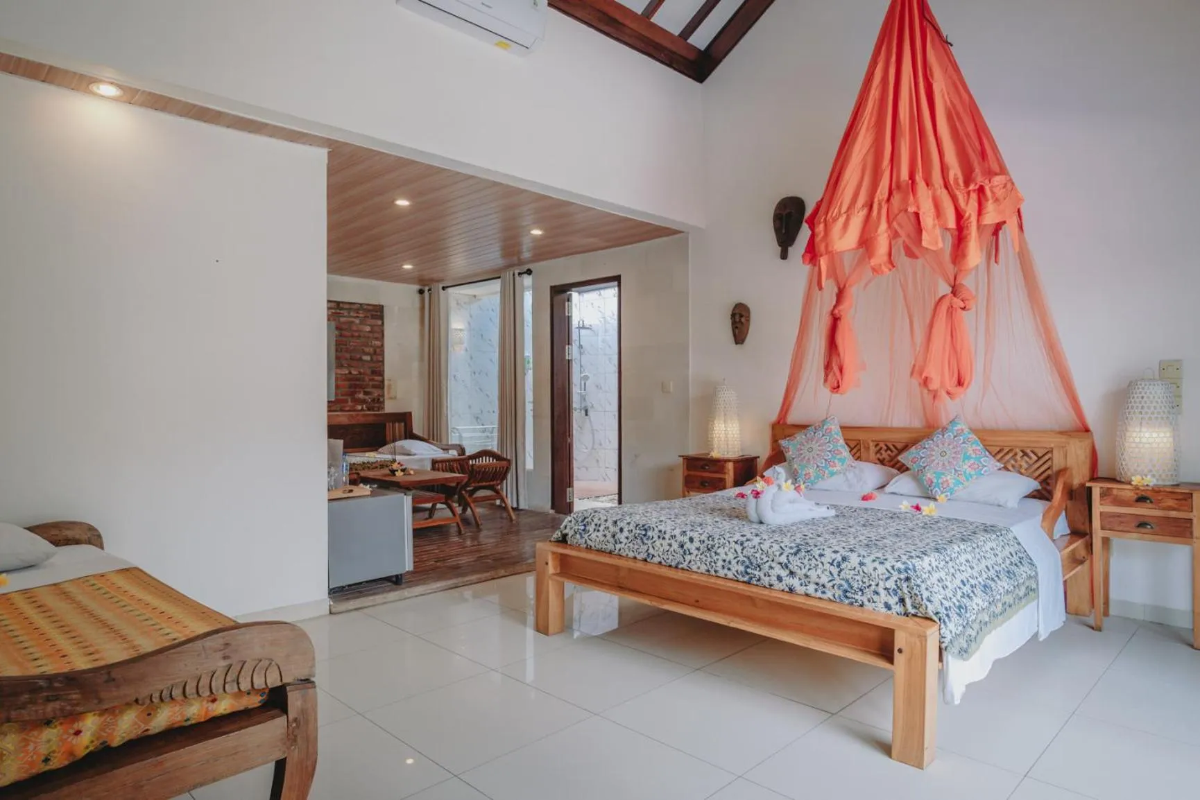 Bed in Frangipani Beach Hotel