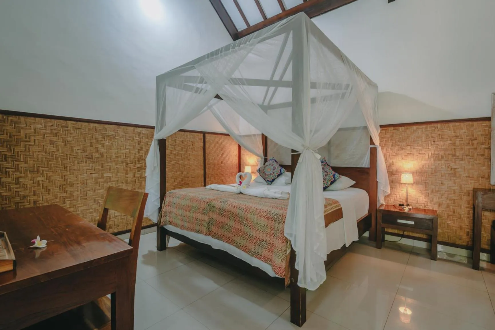 Bed in Frangipani Beach Hotel