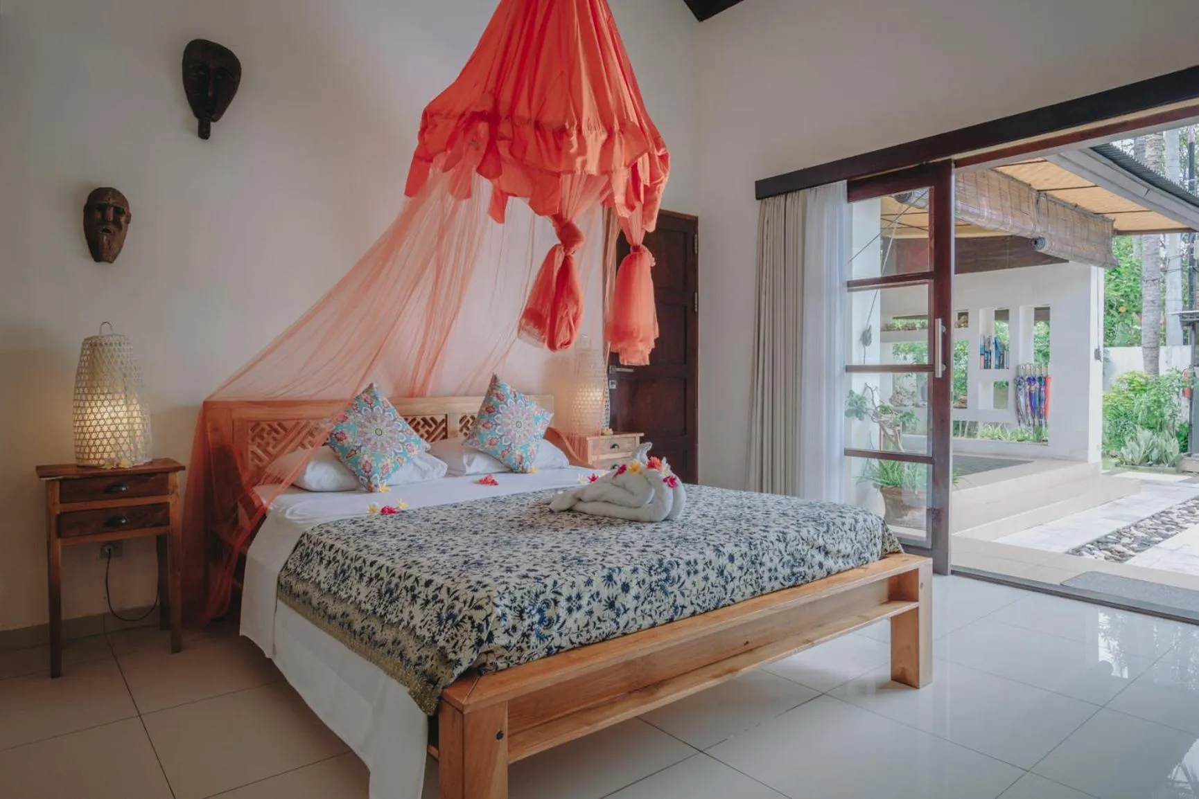 Bed in Frangipani Beach Hotel