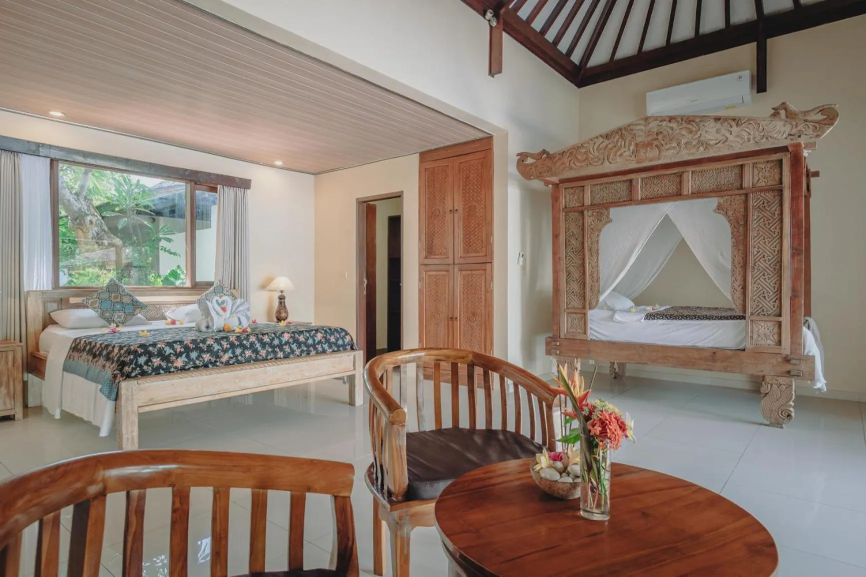 Bed in Frangipani Beach Hotel