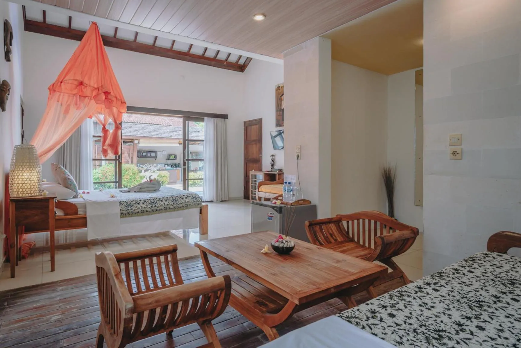 Bed in Frangipani Beach Hotel