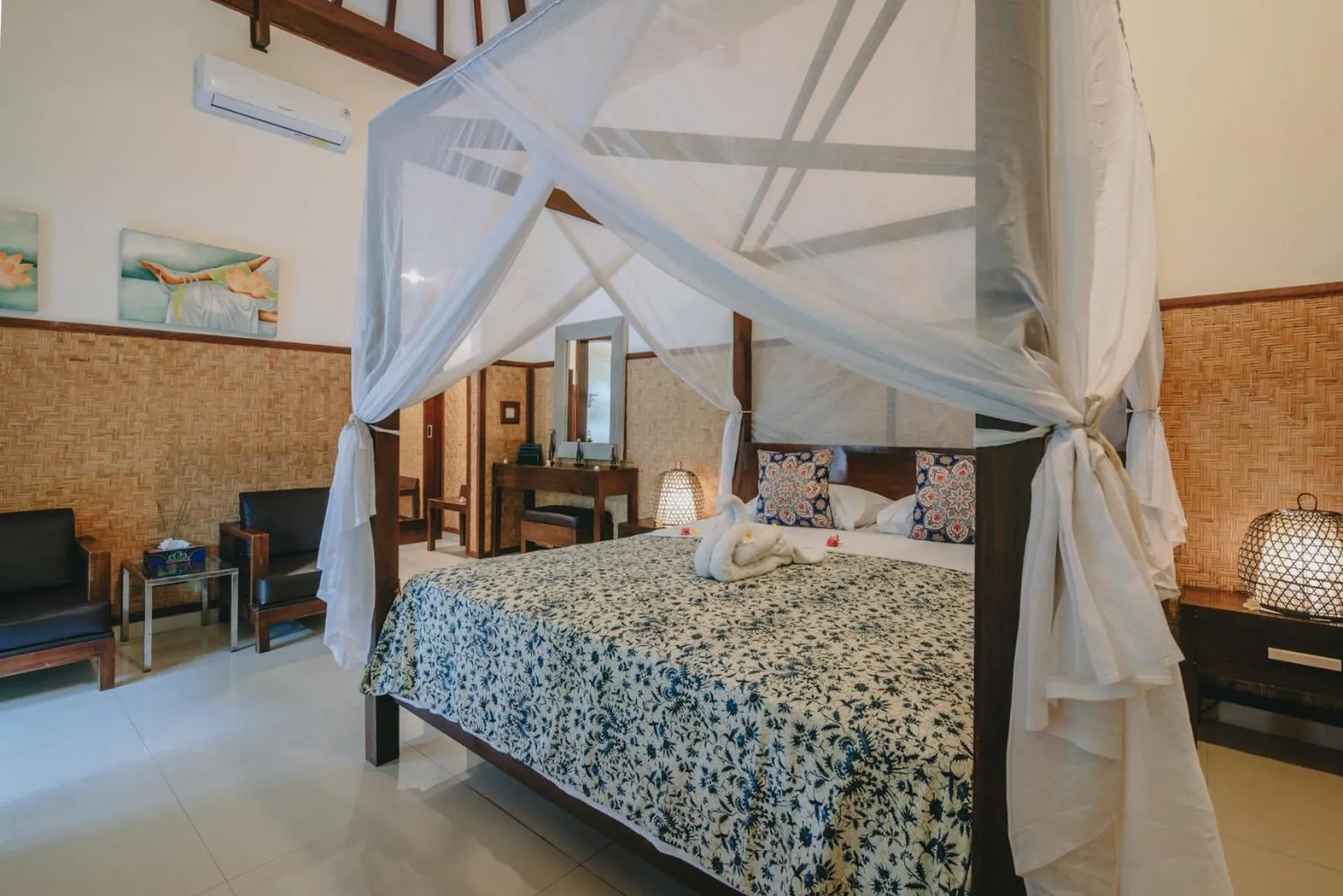 Bed in Frangipani Beach Hotel