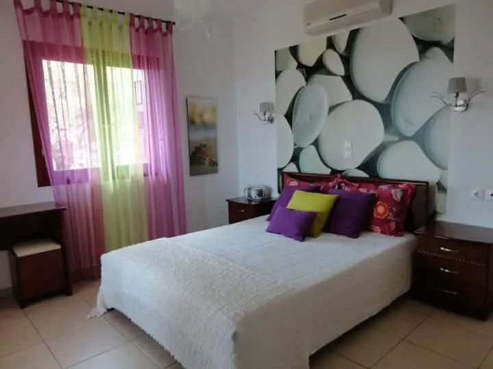 Bed in Skiathos Garden Cottages