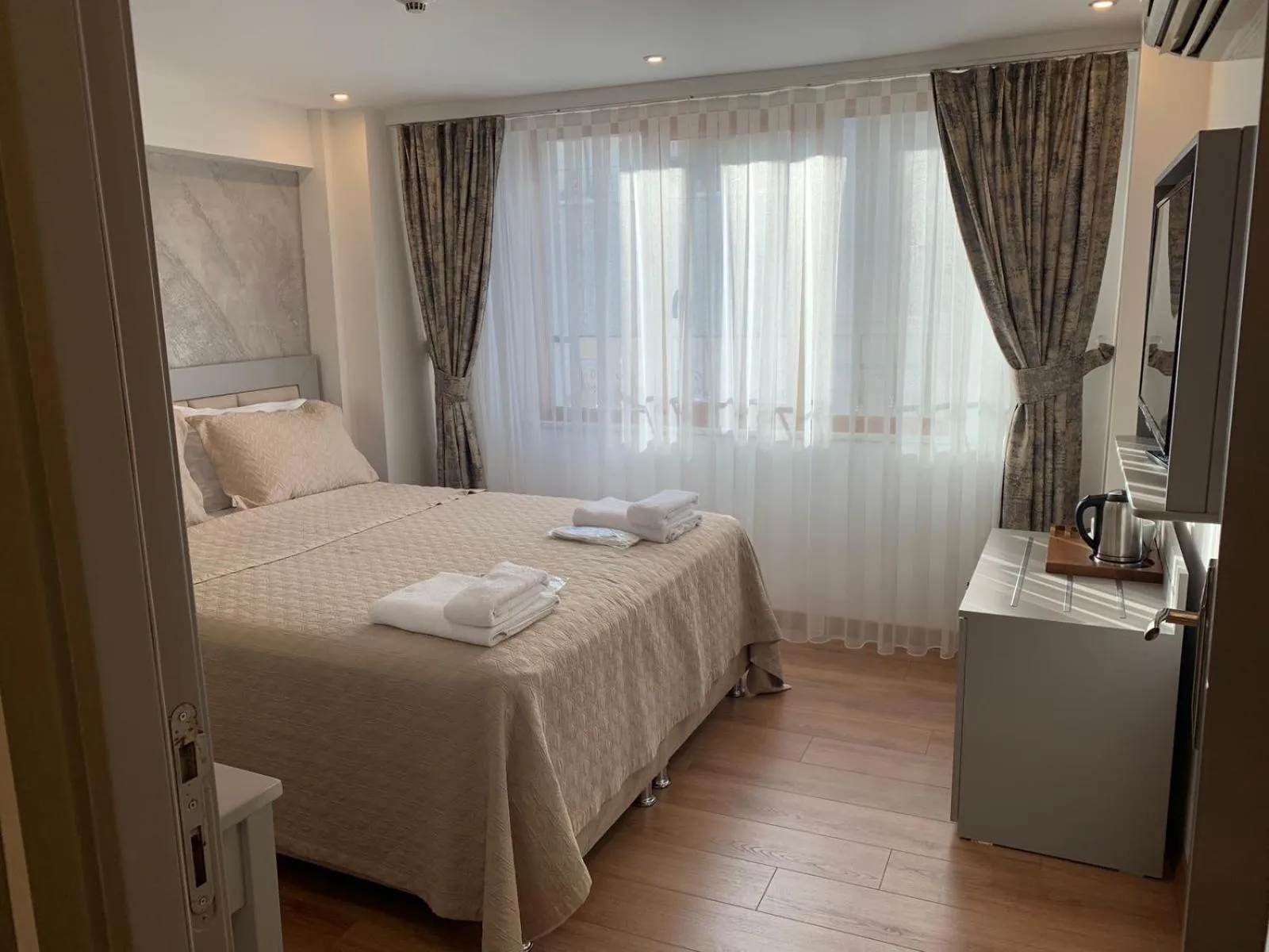 Bed in Regency World Hotel