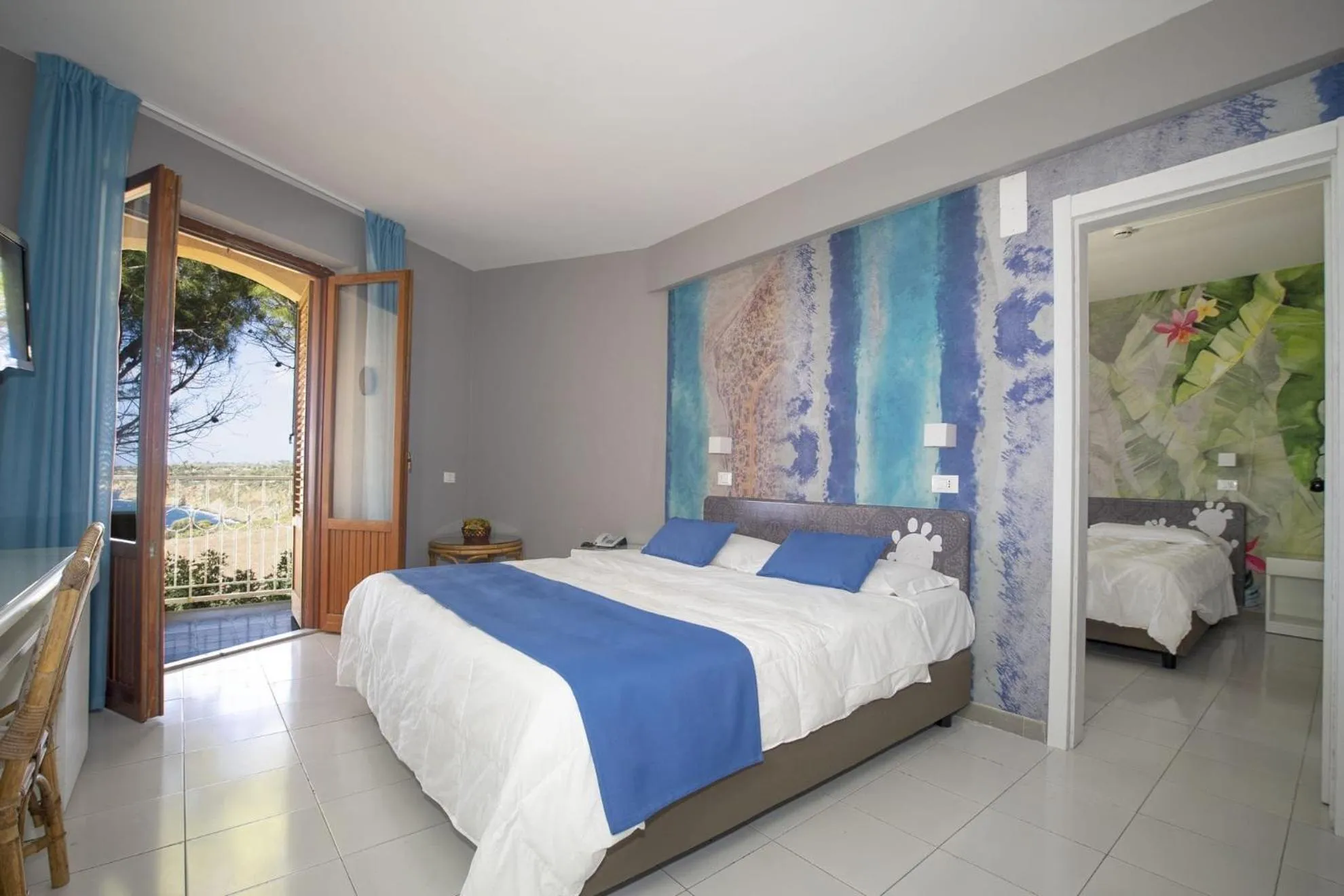 Bed in Perla Del Golfo Resort