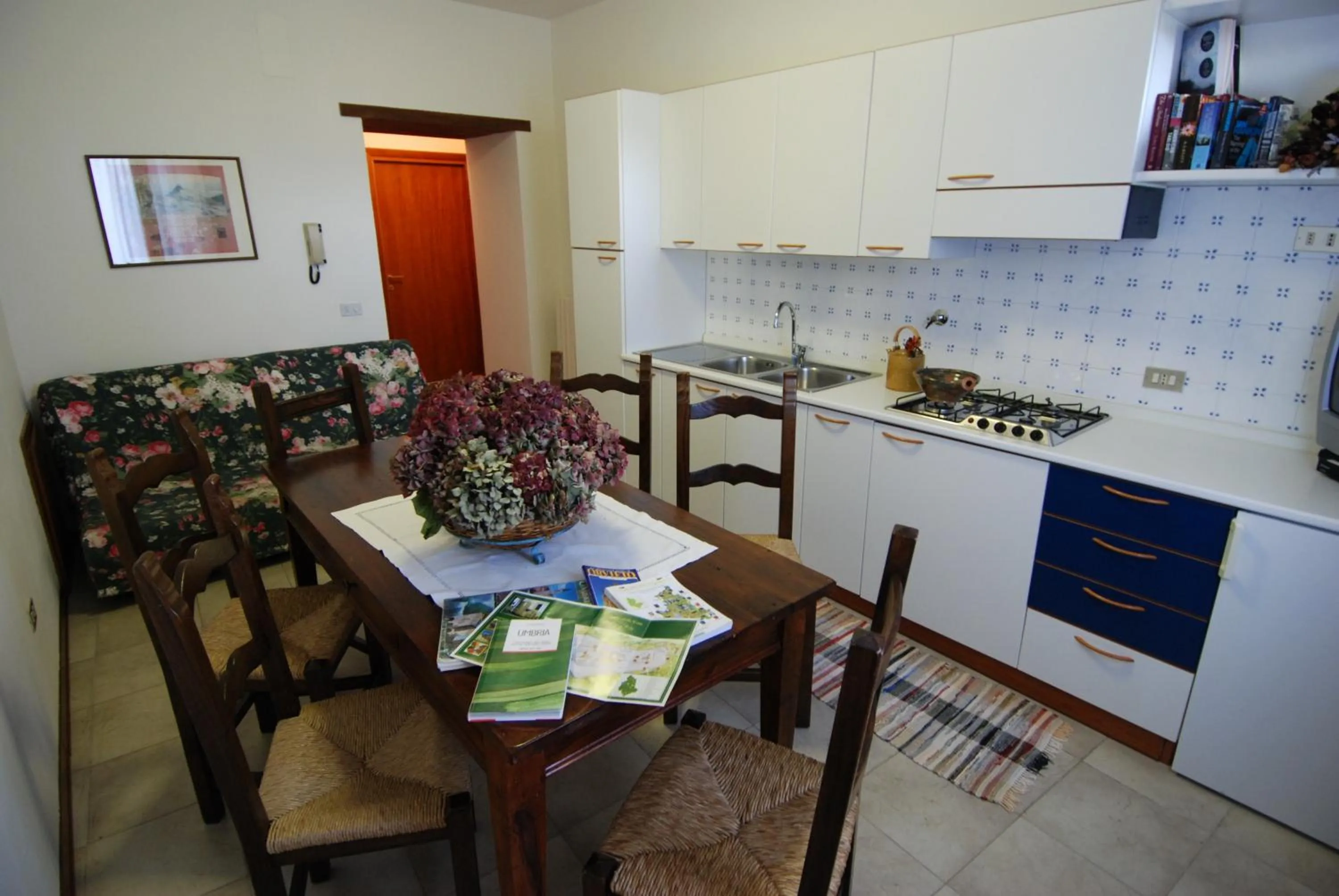 Kitchen or kitchenette in L'Oasi