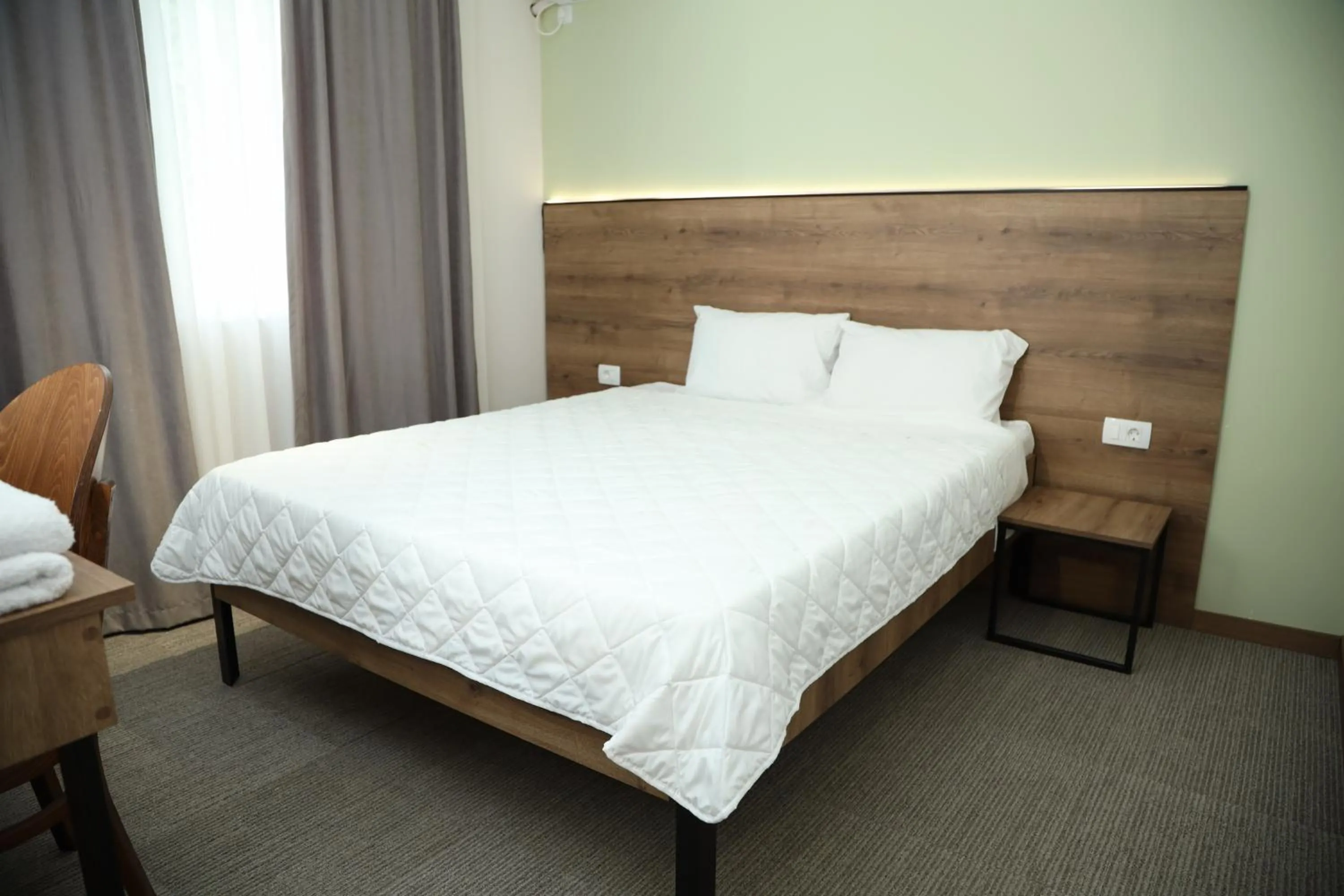Bed in KOKINO Hotel & Winery