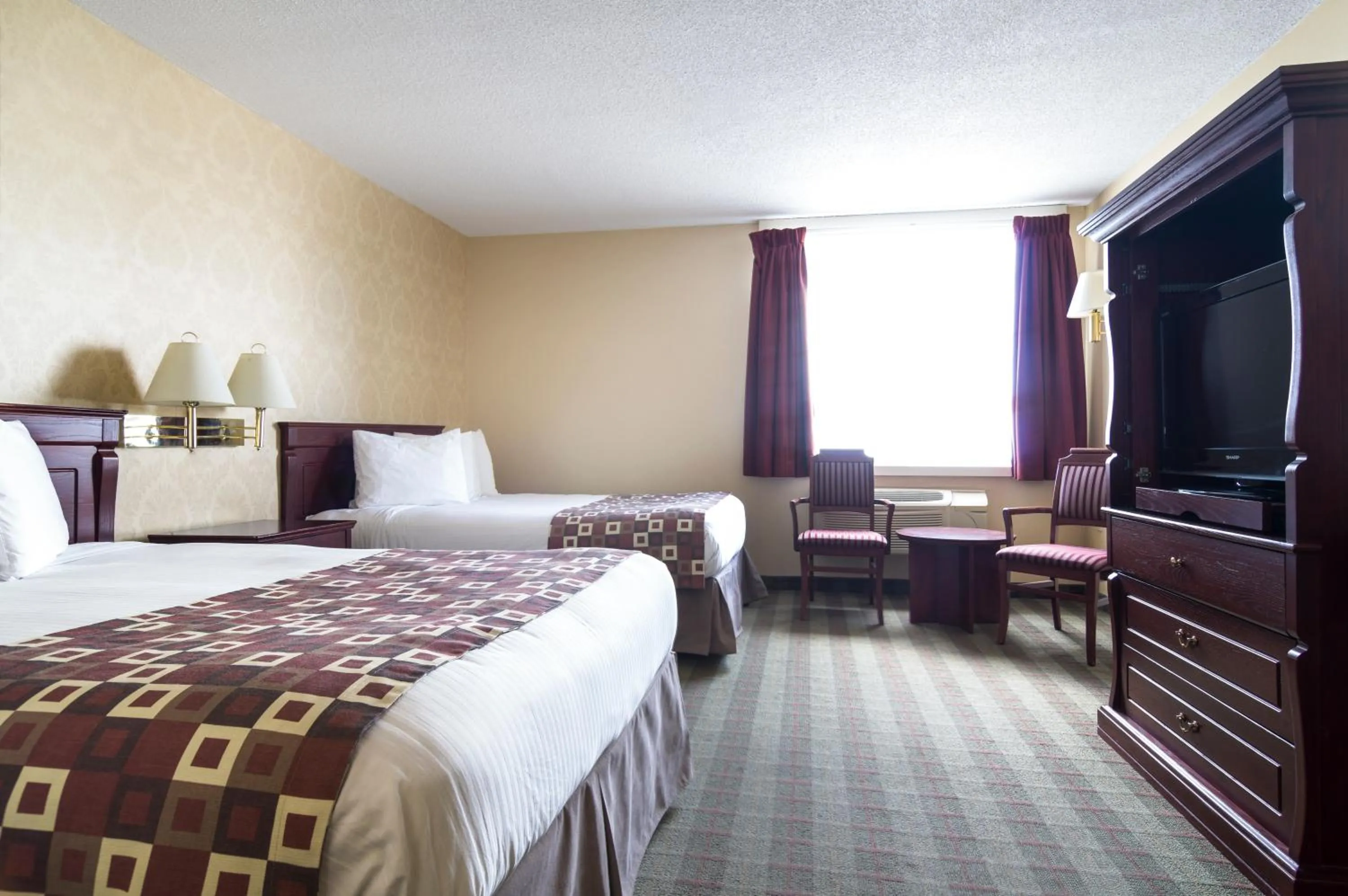 Bed in Albatross Hotel