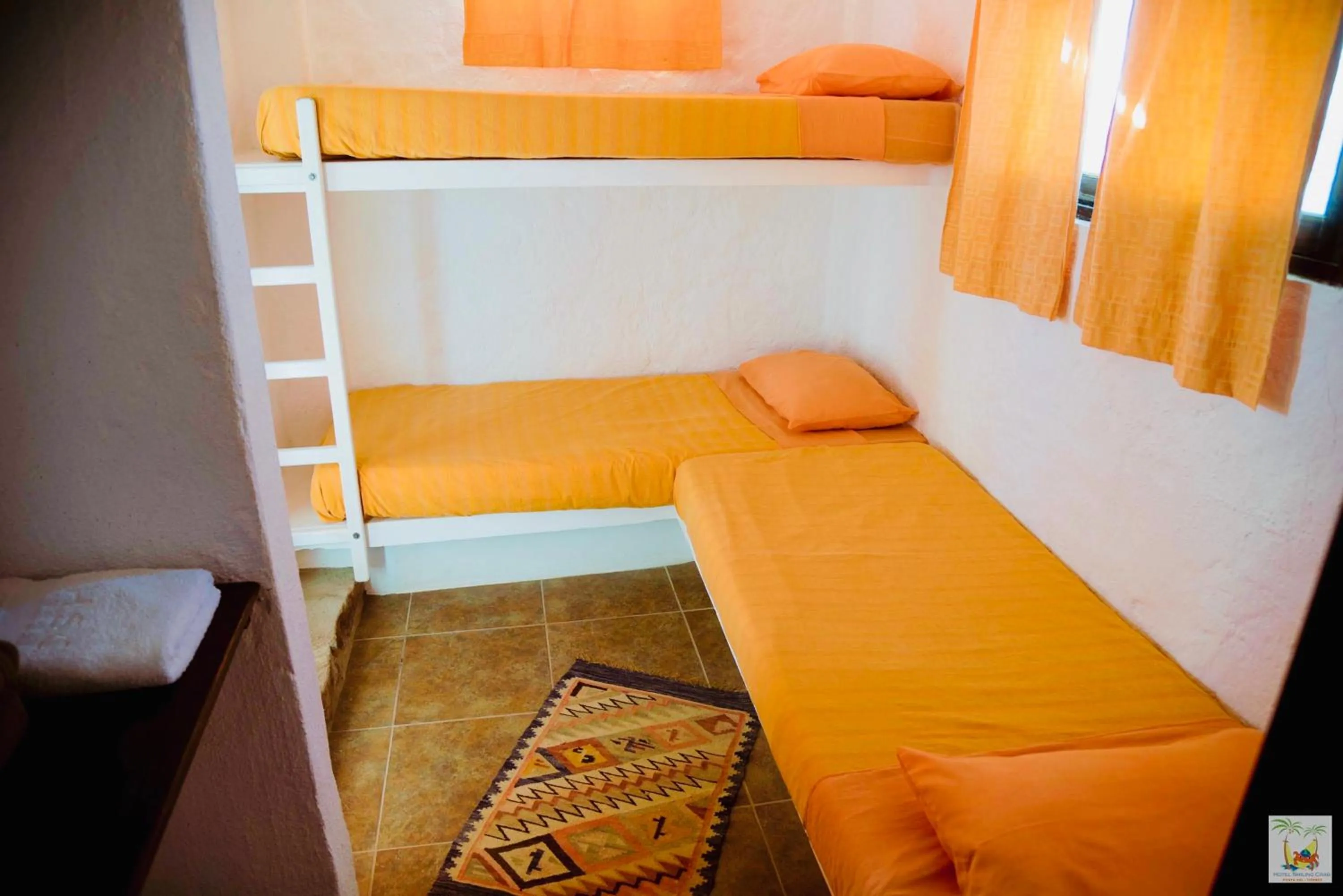 Bed in Hotel Smiling Crab