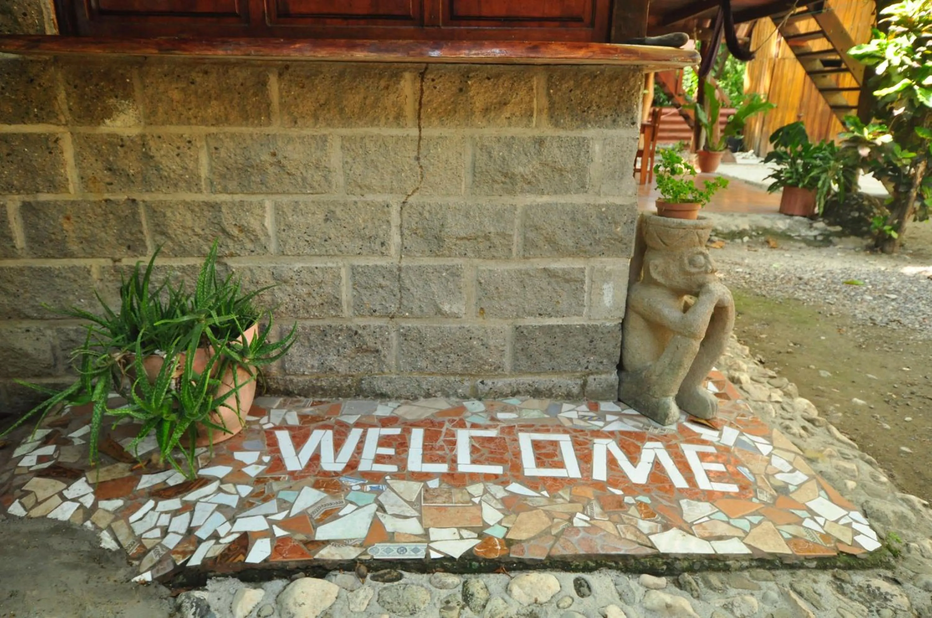Property logo or sign in Howler Monkey Hotel