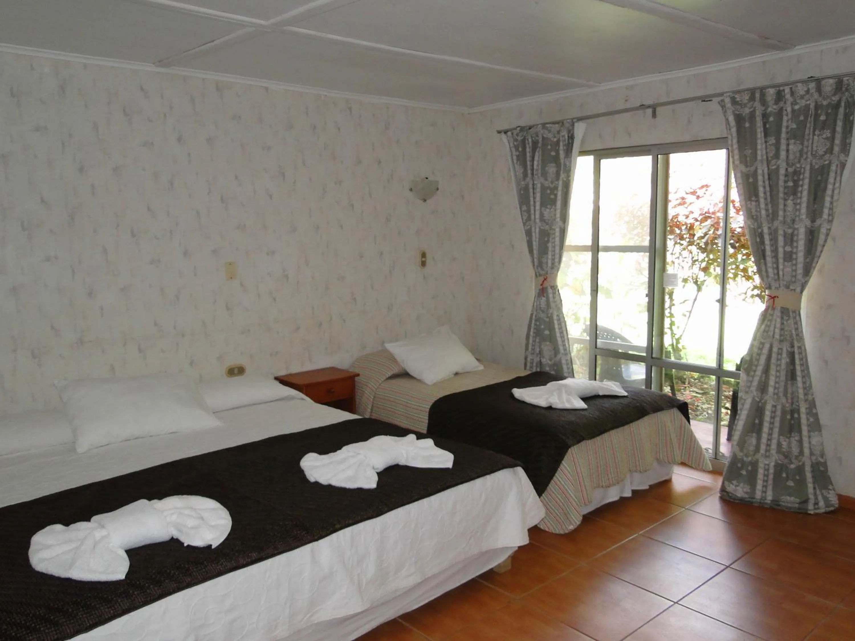 Photo of the whole room, Bed in Tupa Hotel