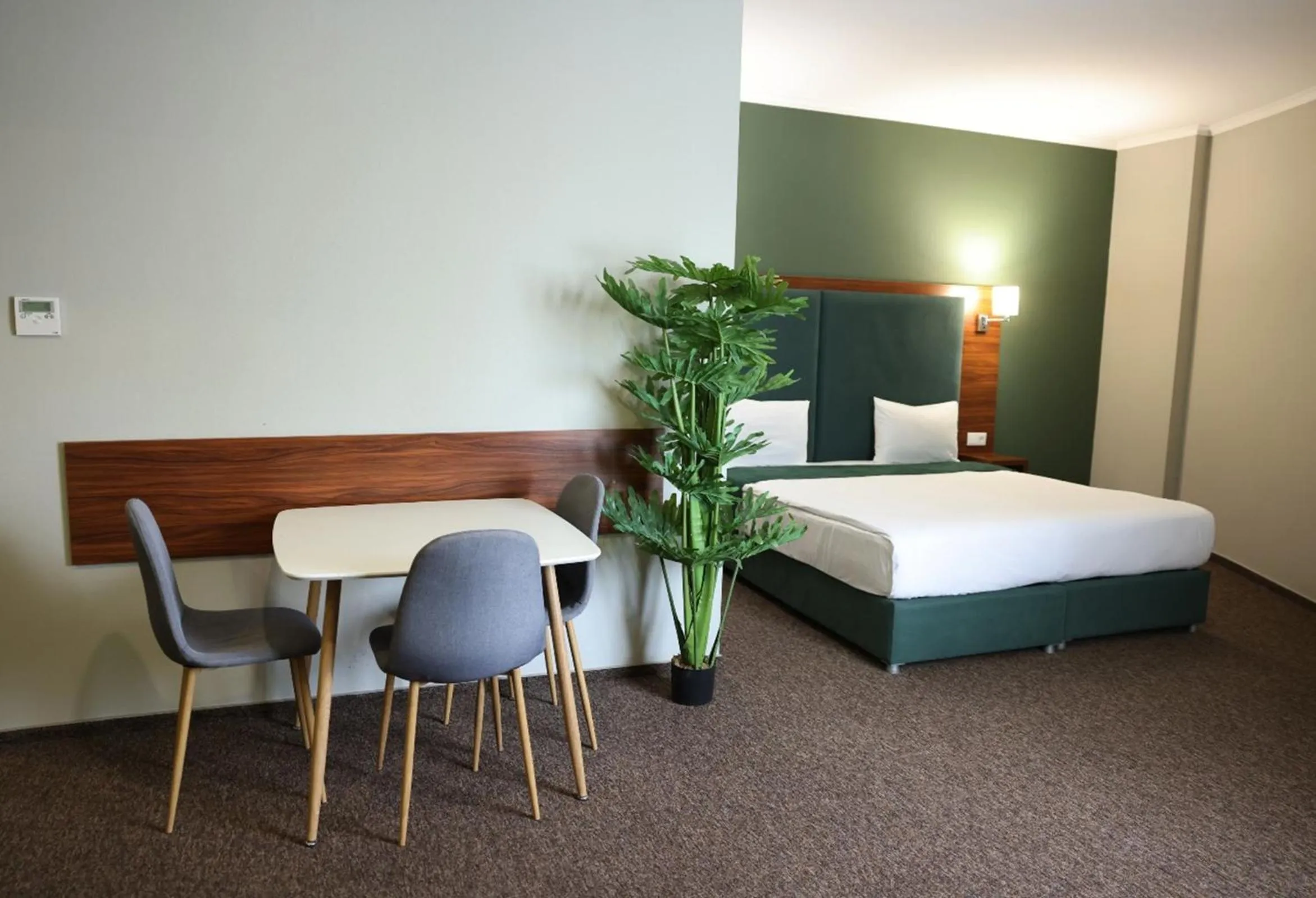 Bed in Green Tower Hotel