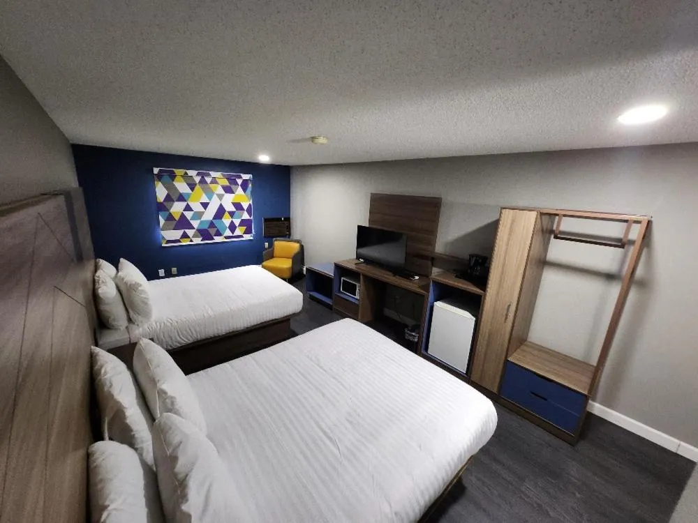 Bed in AmeriVu Inn and Suites - Hayward