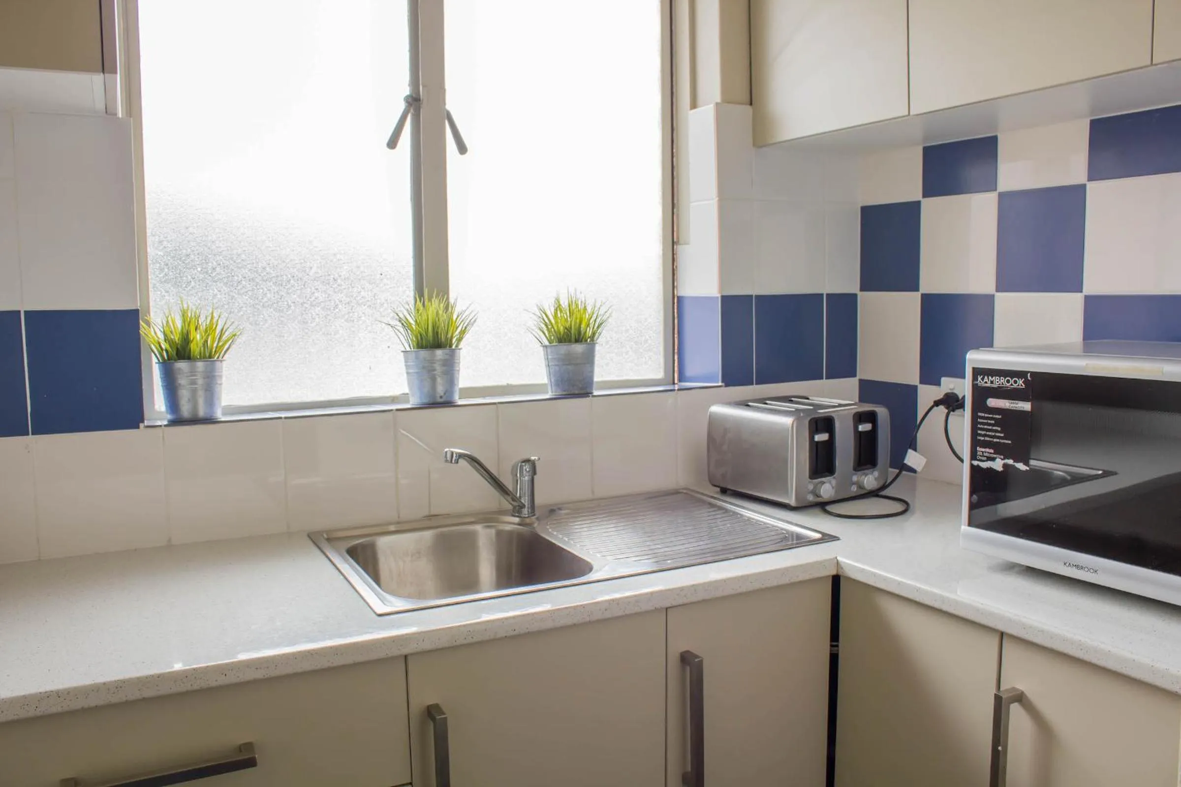 Communal kitchen in Figtree Hotel Wollongong