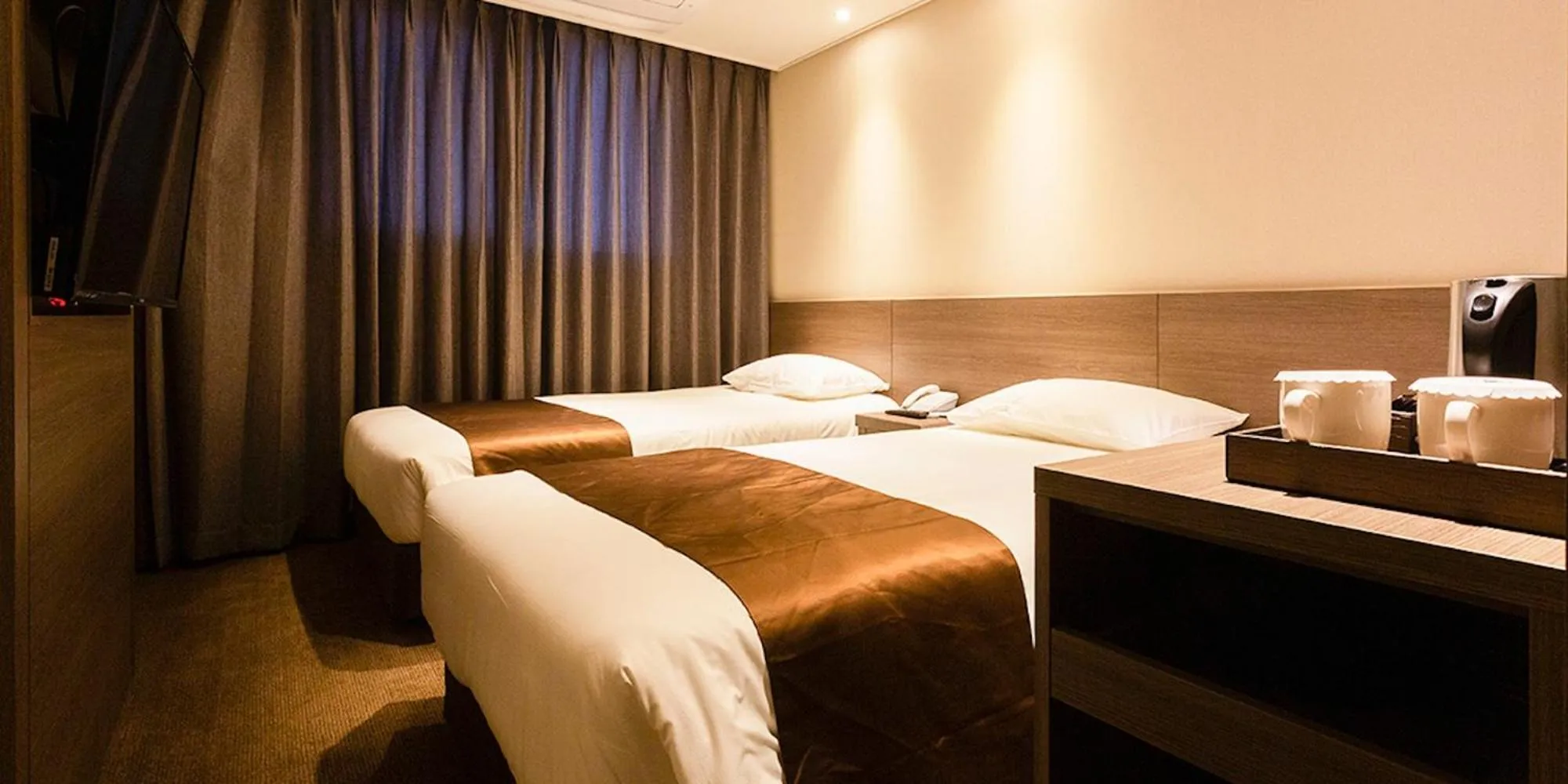 Bed in Grandmillions Hotel Seogwipo