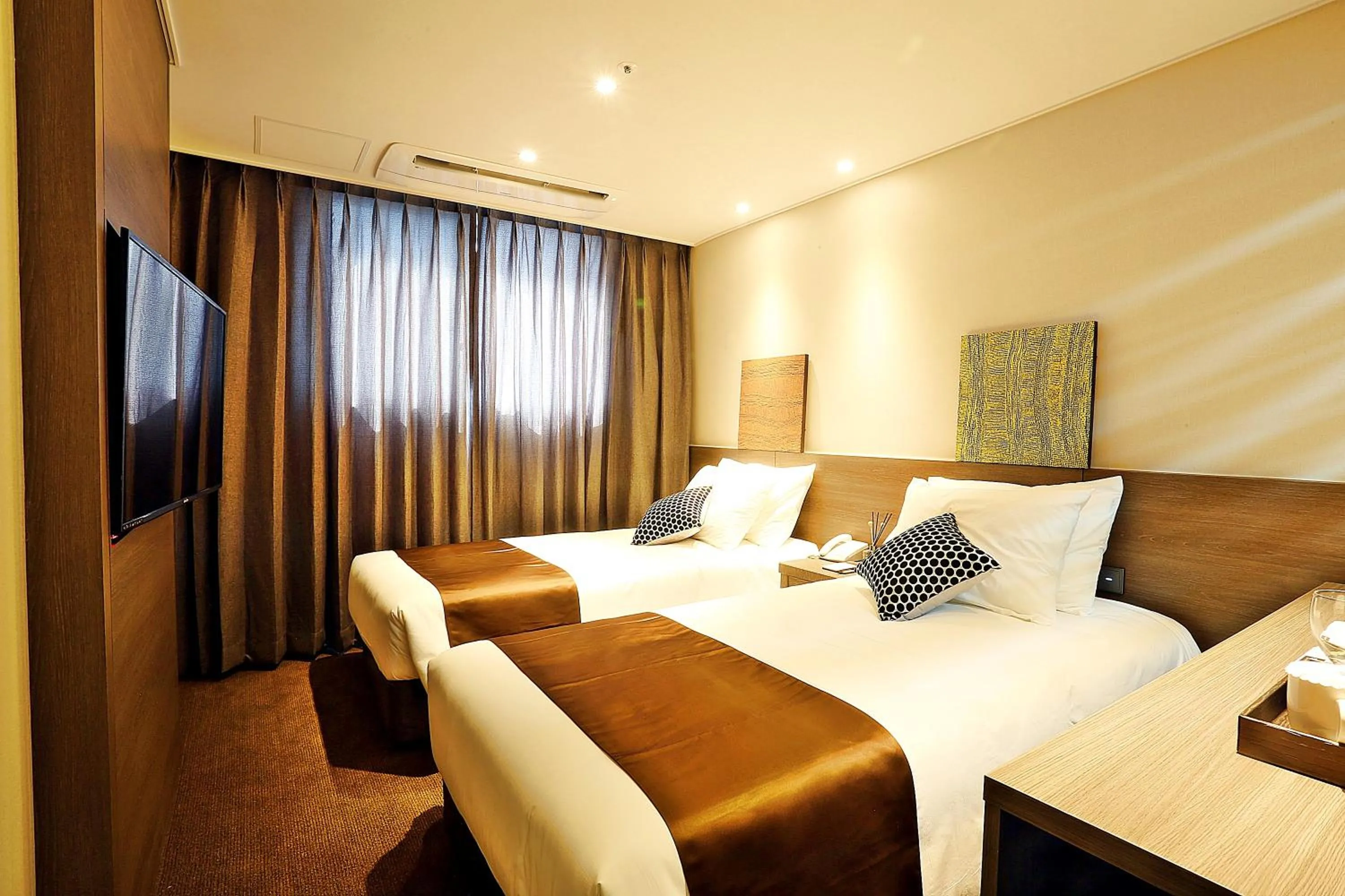 Photo of the whole room, Bed in Grandmillions Hotel Seogwipo