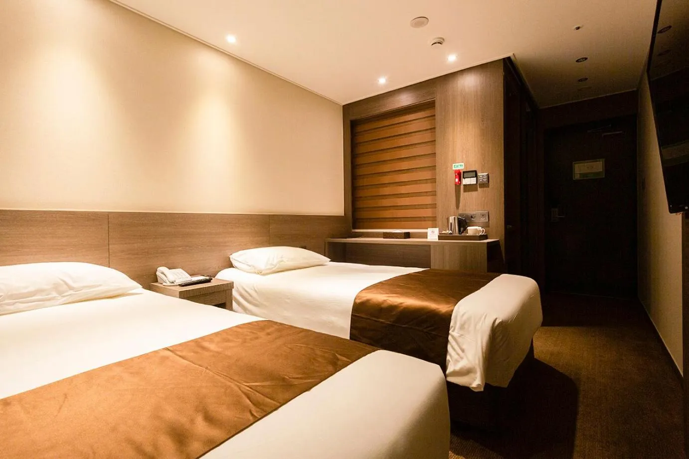 Photo of the whole room, Bed in Grandmillions Hotel Seogwipo