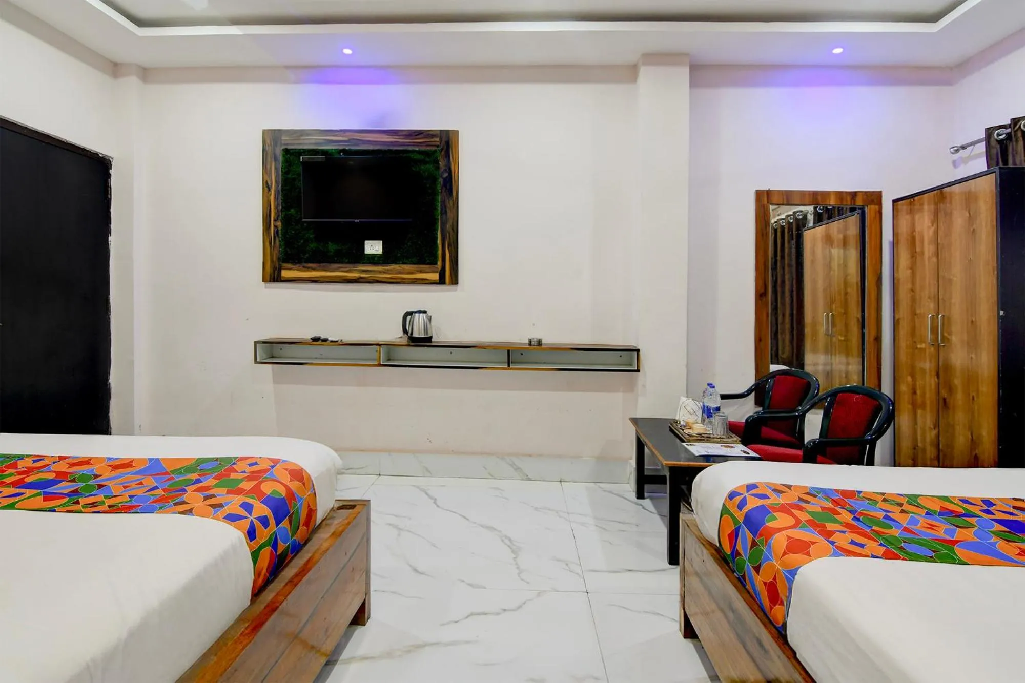 Bed in FabHotel Seven Inn