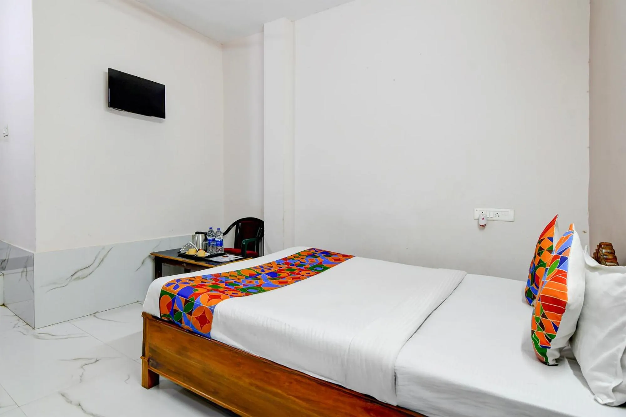 Bed in FabHotel Seven Inn