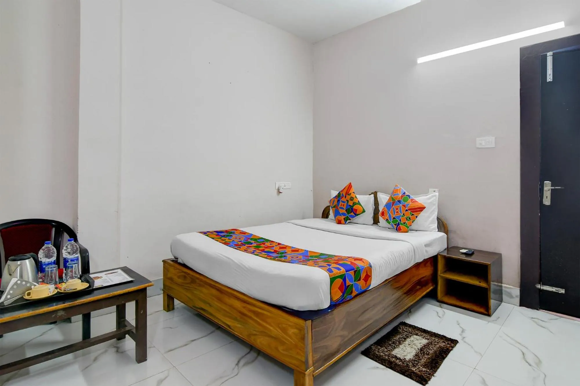 Bed in FabHotel Seven Inn