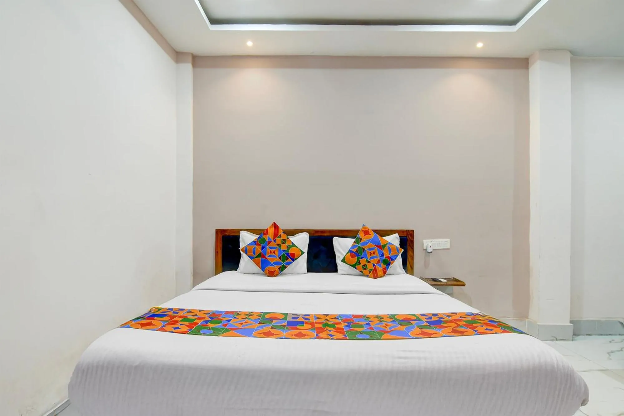 Bed in FabHotel Seven Inn