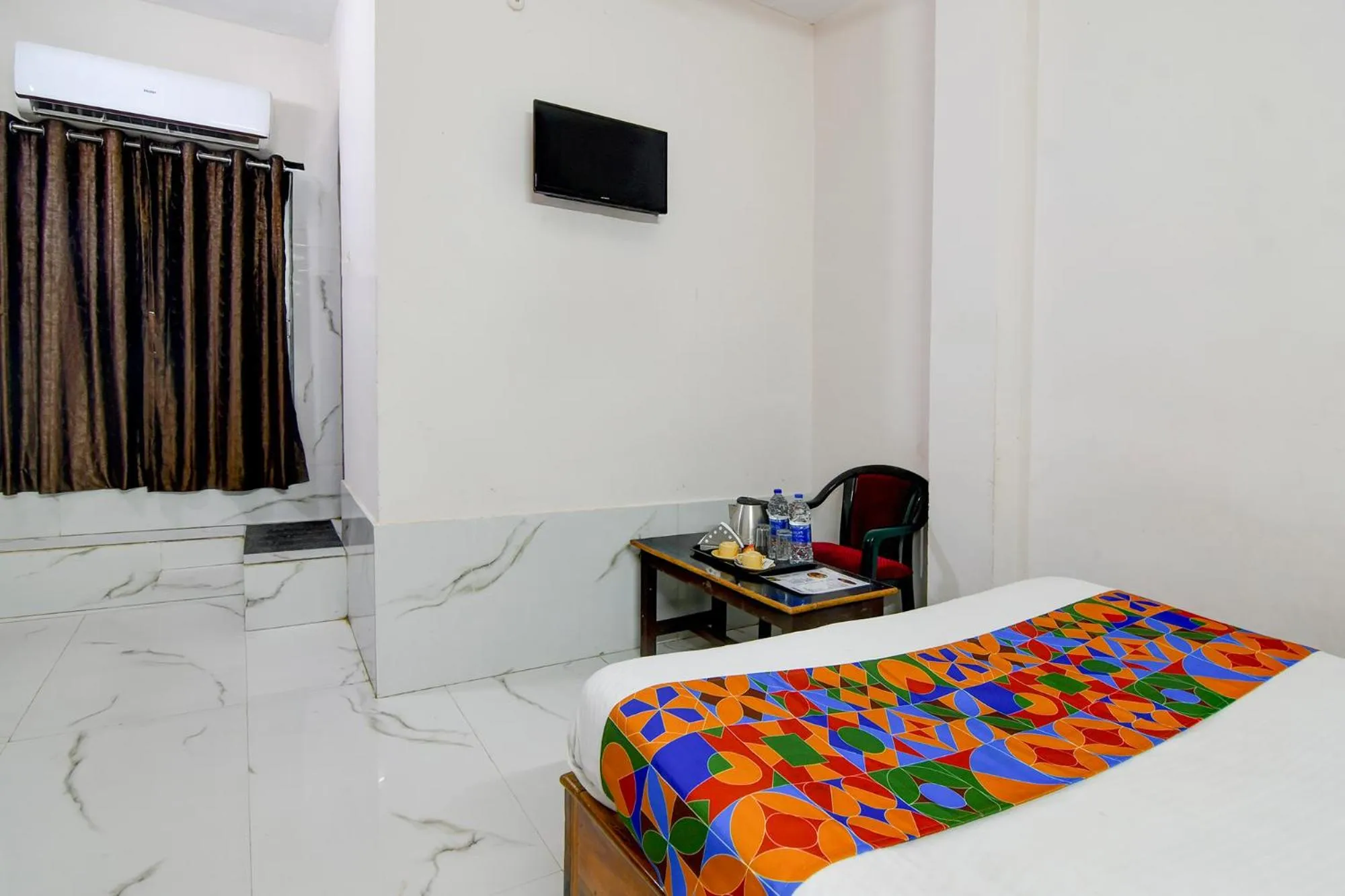 Bed in FabHotel Seven Inn